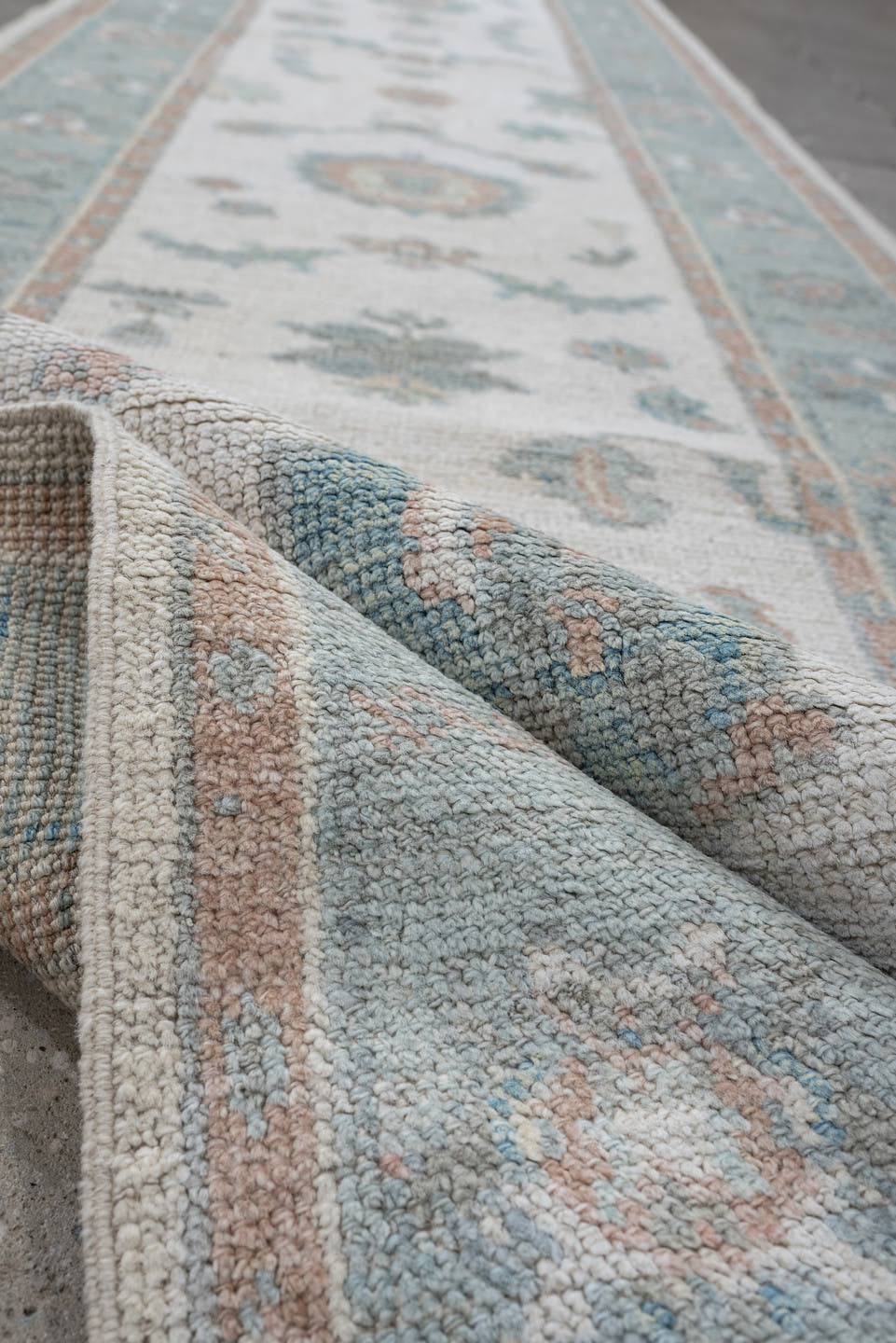 3' x 14' one-of-a-kind handmade vintage Oushak runner rug. Color palette: ivory, aqua, blush, sage, pale blue, taupe, teal