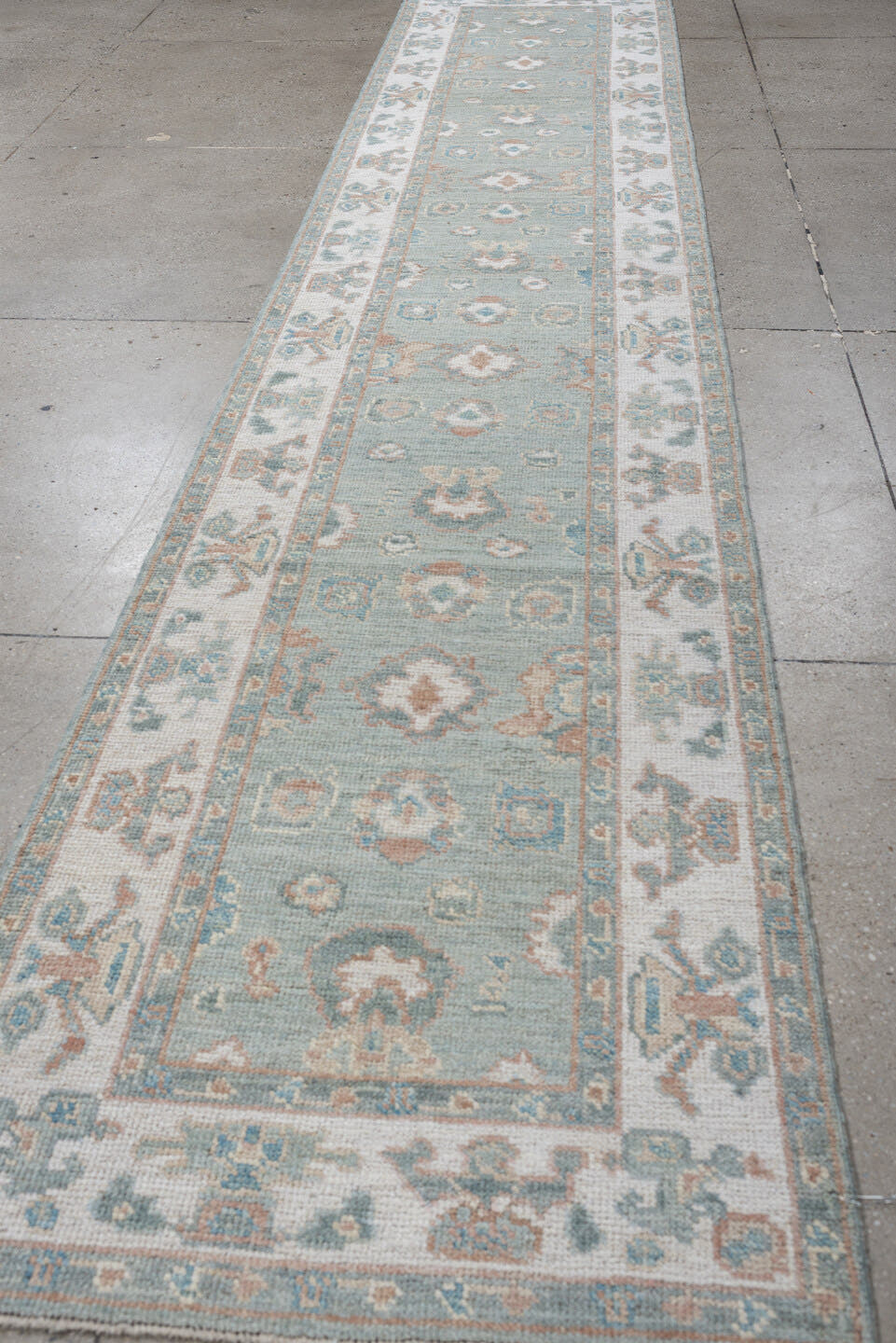 2' x 14' one-of-a-kind handmade vintage Oushak runner rug. Color palette: aqua, ivory, blush, taupe, sage, teal, pink, beige