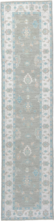 3' x 12' one-of-a-kind handmade vintage Oushak runner rug. Color palette: sage, ivory, aqua, blush, taupe, cream, green