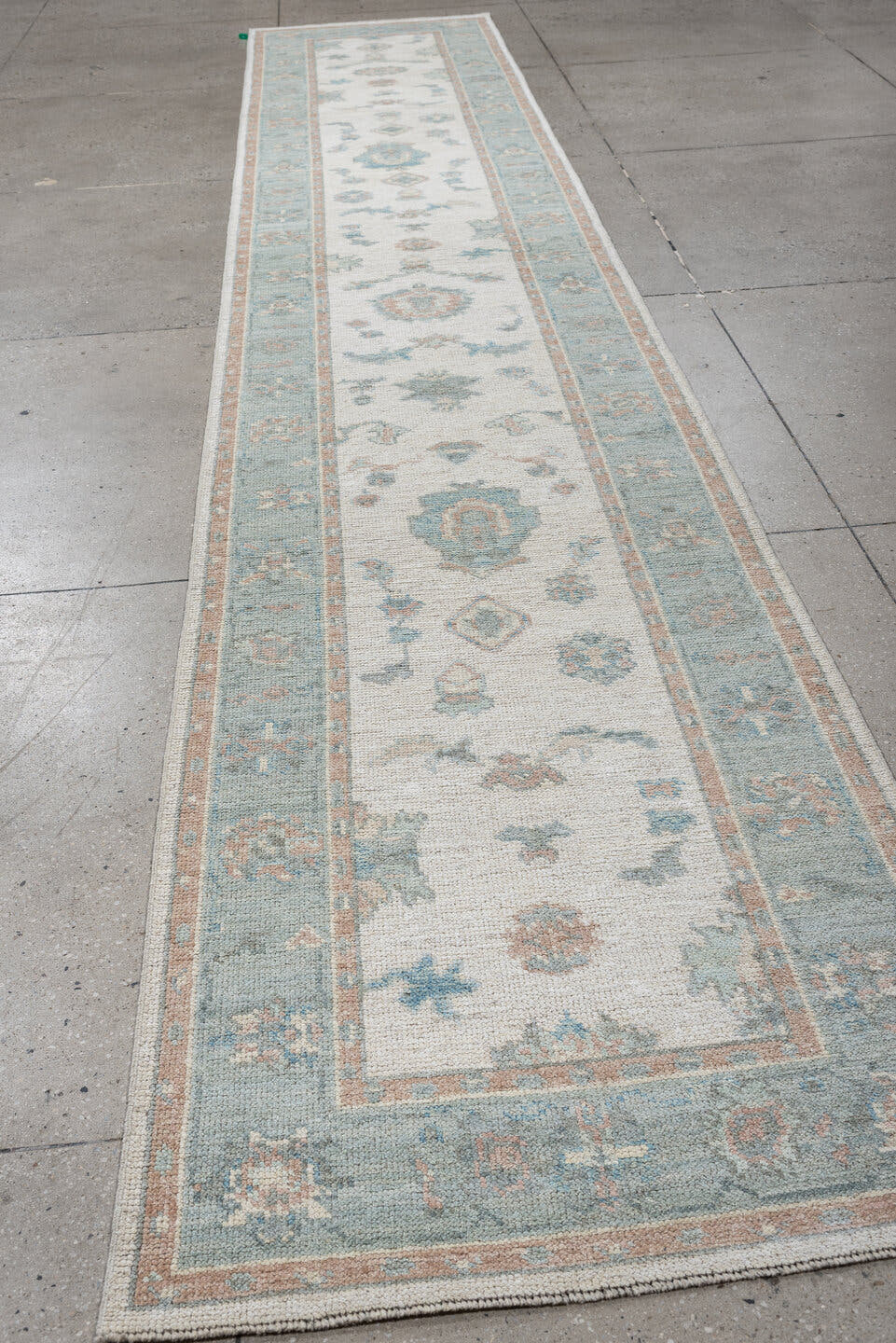 3' x 15' one-of-a-kind handmade vintage Oushak runner rug. Color palette: ivory, pale aqua, blush, taupe, sage, teal, pink