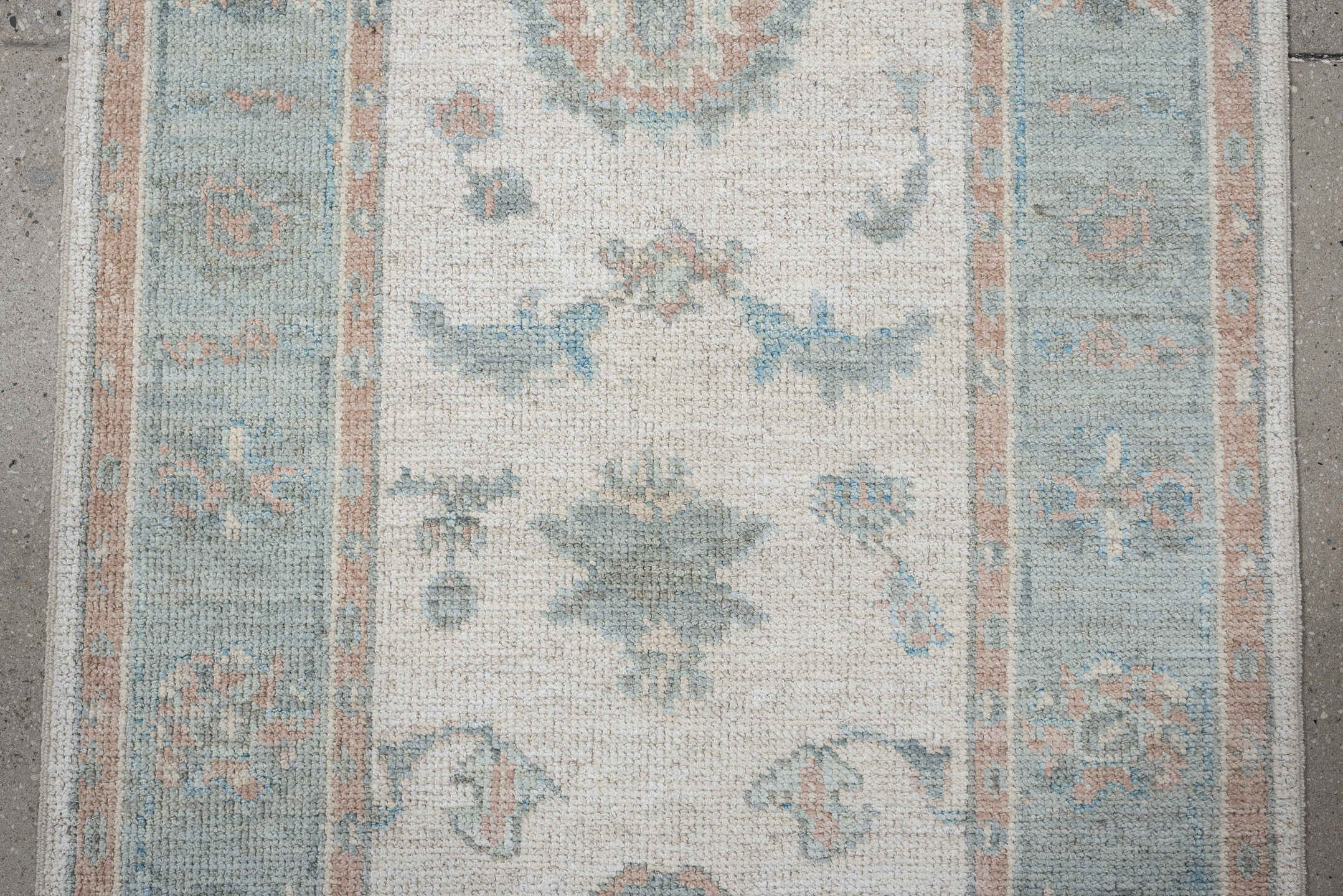 3' x 15' one-of-a-kind handmade vintage Oushak runner rug. Color palette: ivory, pale aqua, blush, taupe, sage, teal, pink