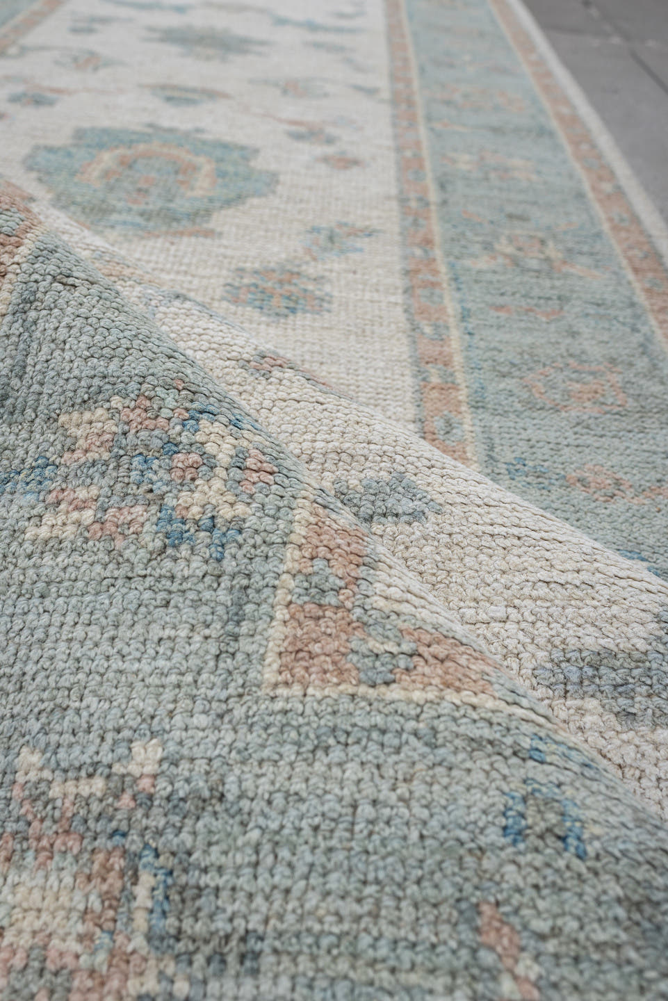 3' x 15' one-of-a-kind handmade vintage Oushak runner rug. Color palette: ivory, pale aqua, blush, taupe, sage, teal, pink