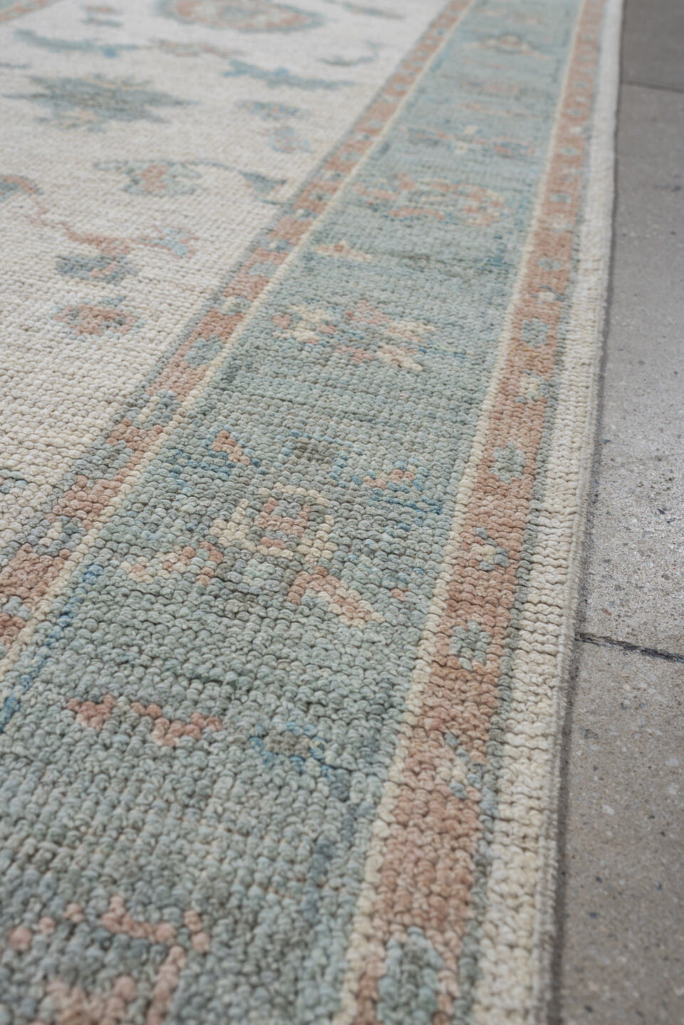 3' x 15' one-of-a-kind handmade vintage Oushak runner rug. Color palette: ivory, pale aqua, blush, taupe, sage, teal, pink
