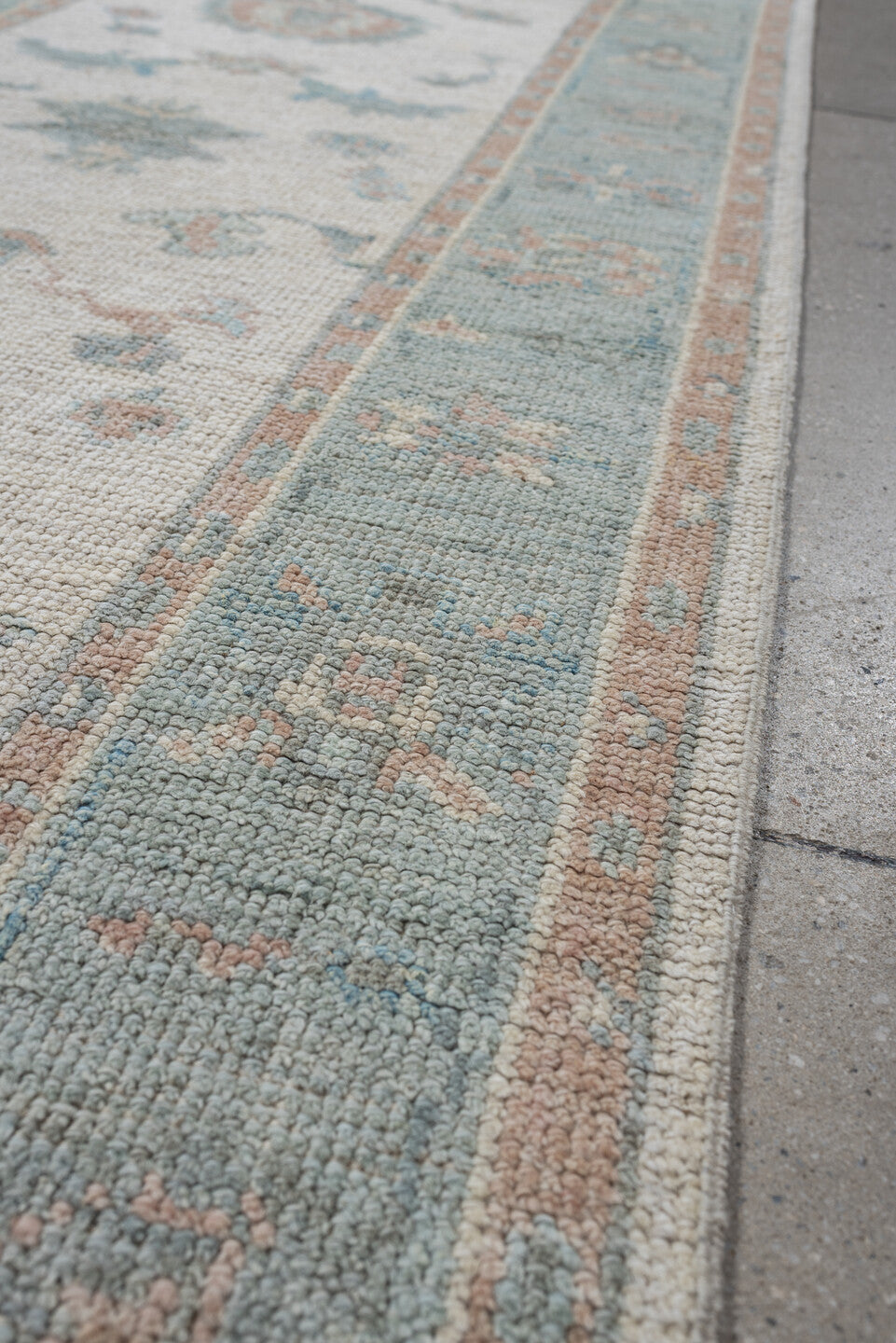 3' x 15' one-of-a-kind handmade vintage Oushak runner rug. Color palette: ivory, pale aqua, blush, taupe, sage, teal, pink