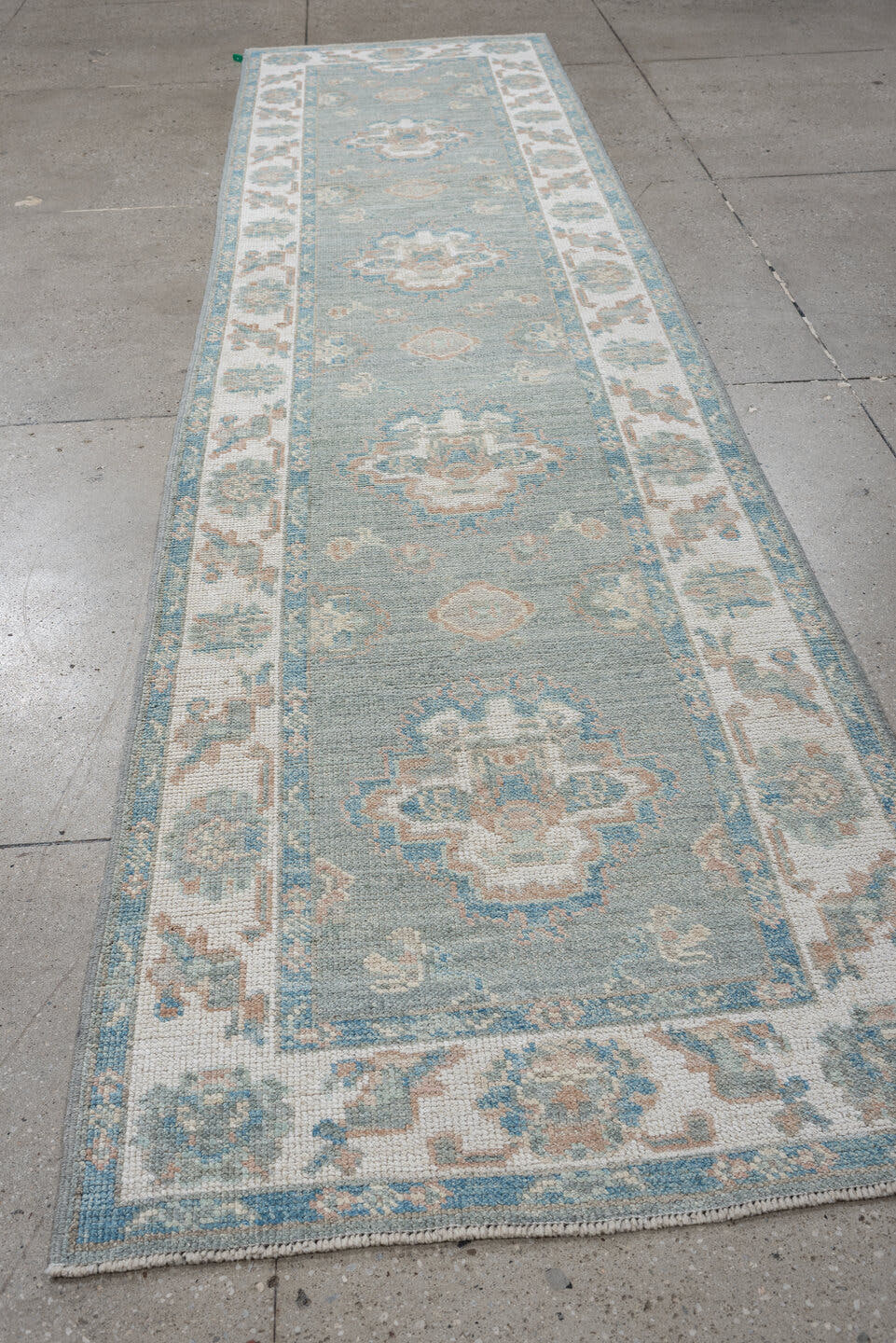 3' x 12' one-of-a-kind handmade vintage Oushak runner rug. Color palette: sky blue, ivory, beige, taupe, sage, light blue