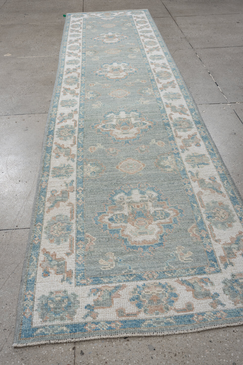 3' x 12' one-of-a-kind handmade vintage Oushak runner rug. Color palette: sky blue, ivory, beige, taupe, sage, light blue