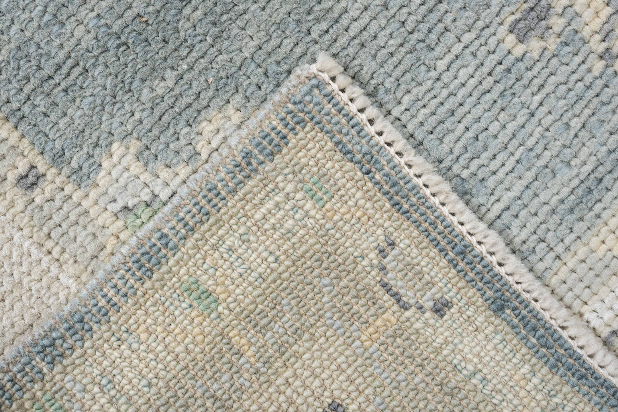 3' x 9' one-of-a-kind handmade vintage Oushak runner rug. Color palette: pale blue, ivory, sage, taupe, slate, cream
