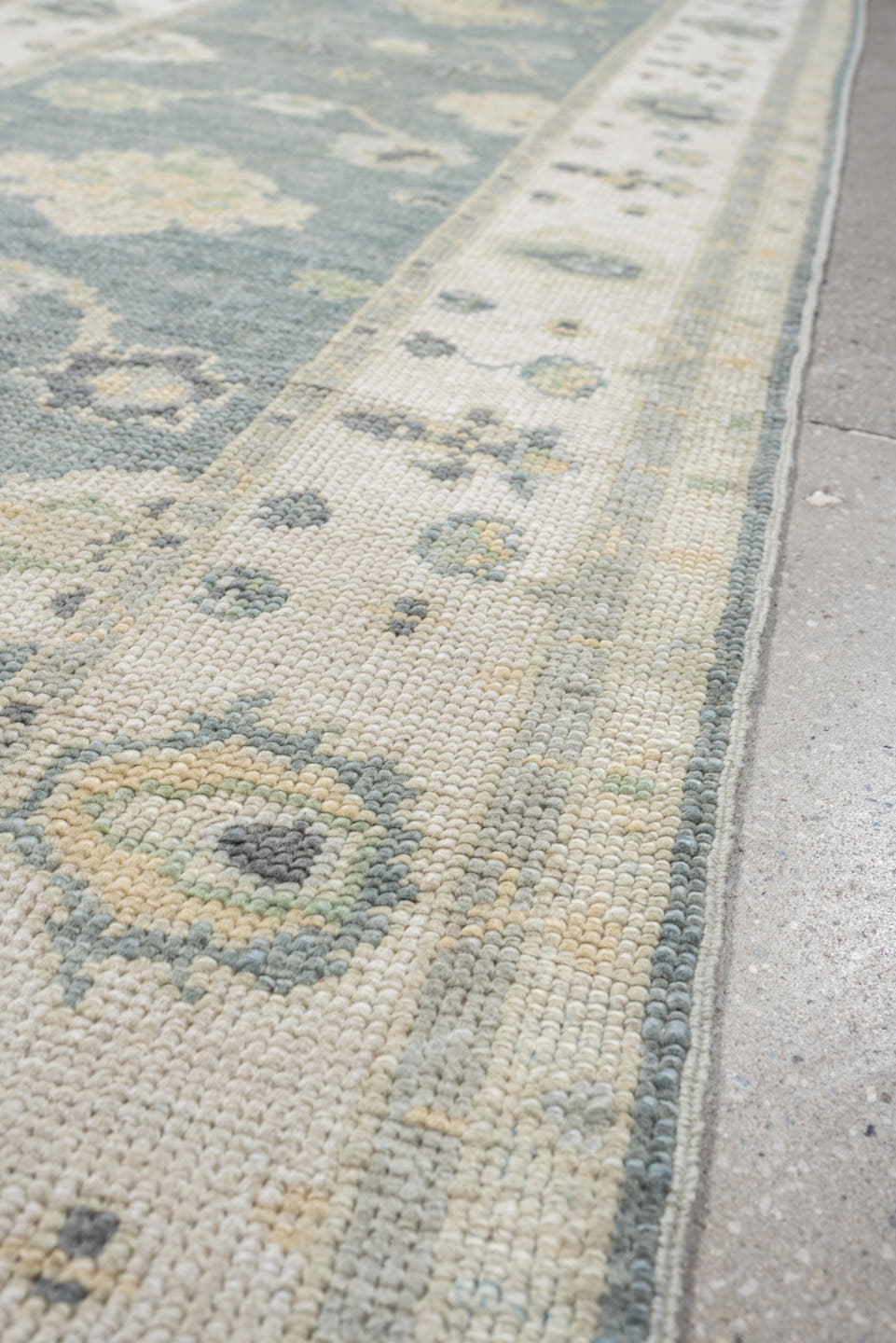 3' x 9' one-of-a-kind handmade vintage Oushak runner rug. Color palette: pale blue, ivory, sage, taupe, slate, cream