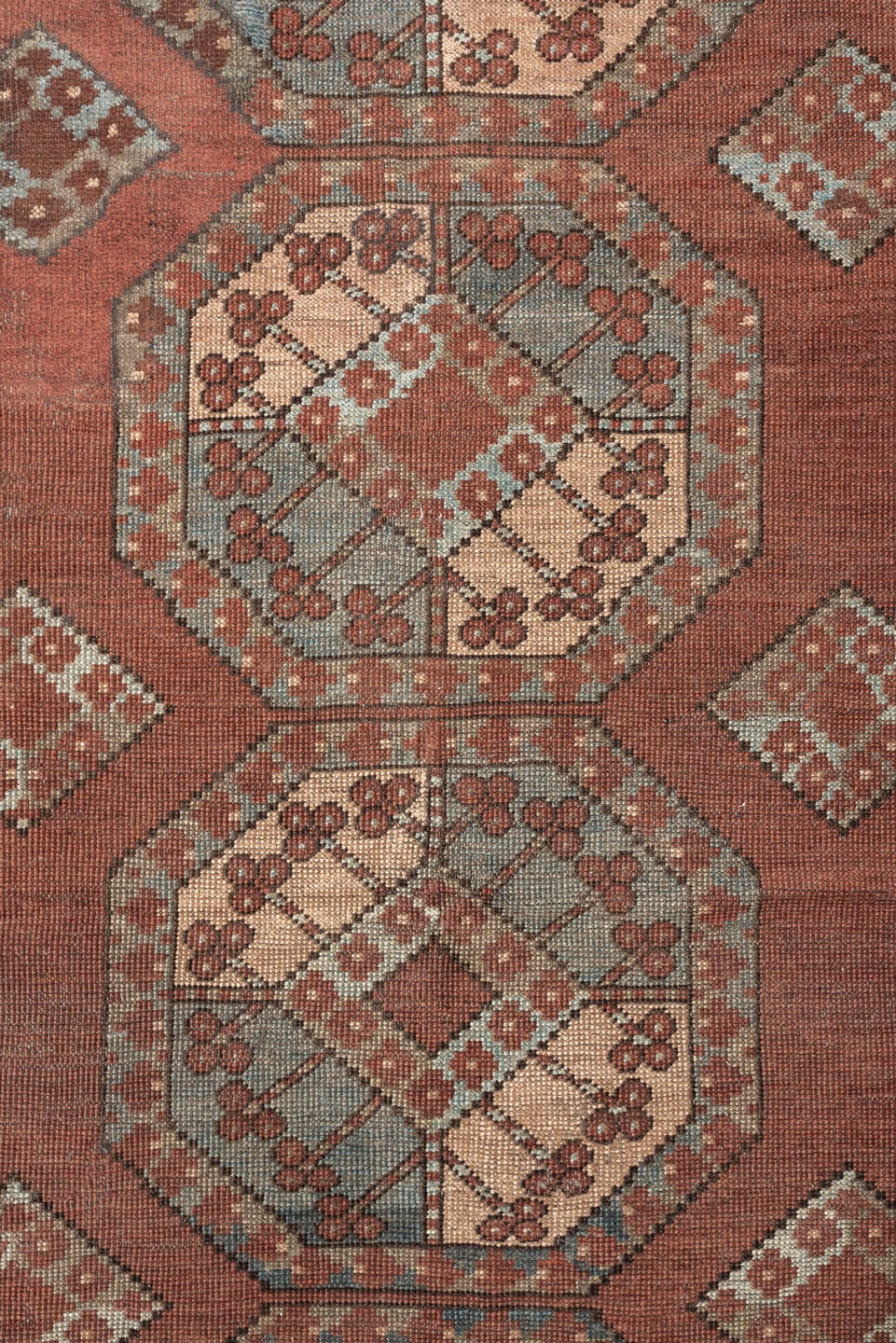 7' x 9' one-of-a-kind handmade vintage Afghan rug. Color palette: terracotta, ivory, blue gray, rust, taupe, camel, brown