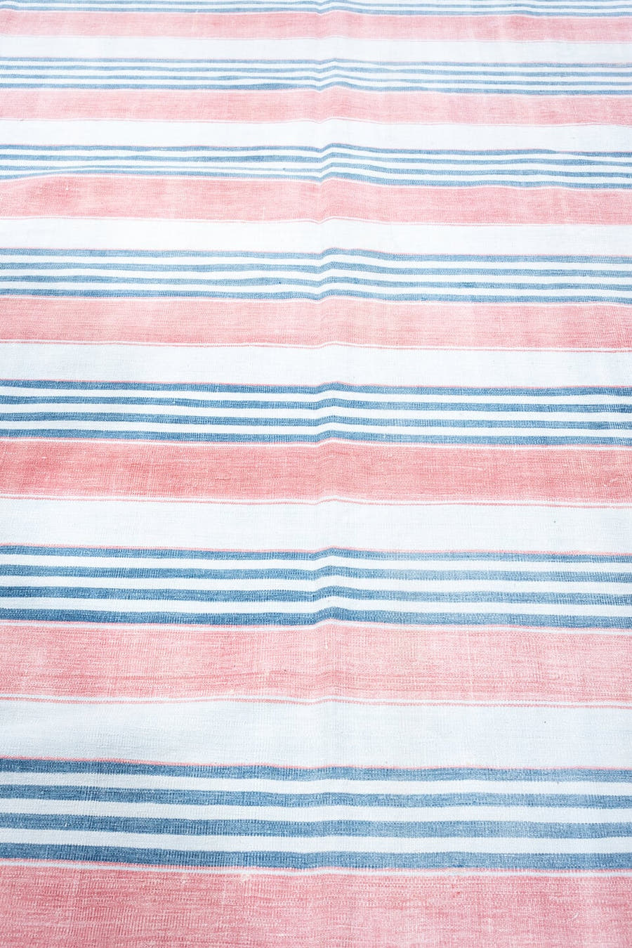 8' x 11' one-of-a-kind handmade vintage Cot Dhurrie large size rug. Color palette: ivory, coral pink, sky blue, pale blue