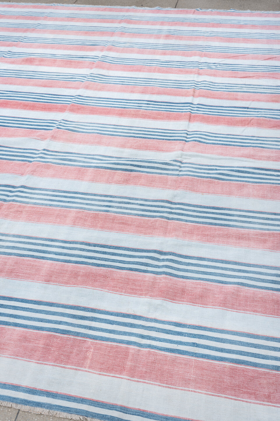 8' x 11' one-of-a-kind handmade vintage Cot Dhurrie large size rug. Color palette: ivory, coral pink, sky blue, pale blue