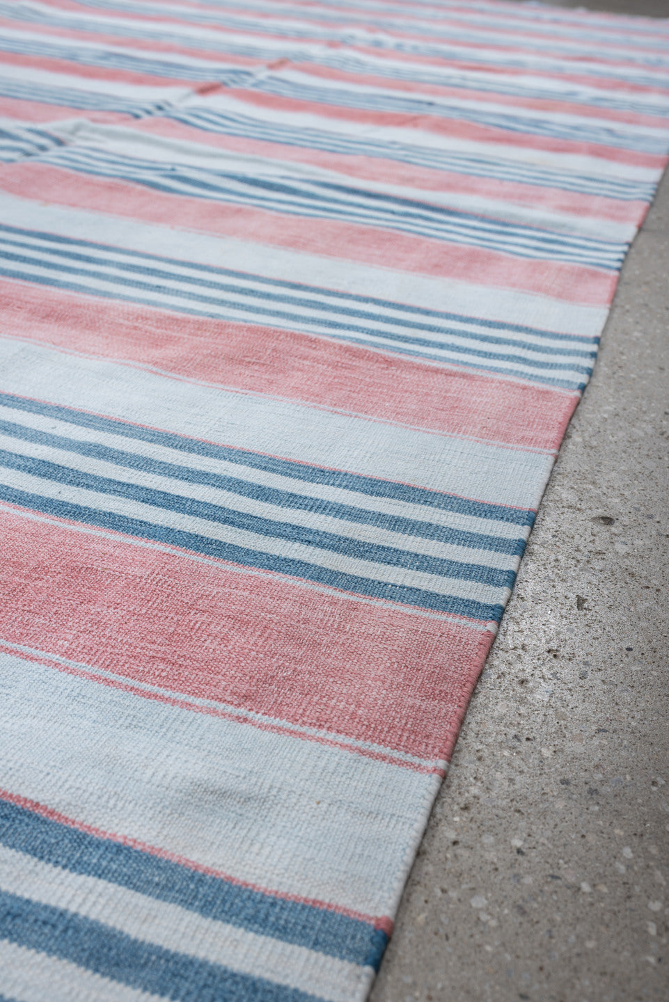 8' x 11' one-of-a-kind handmade vintage Cot Dhurrie large size rug. Color palette: ivory, coral pink, sky blue, pale blue