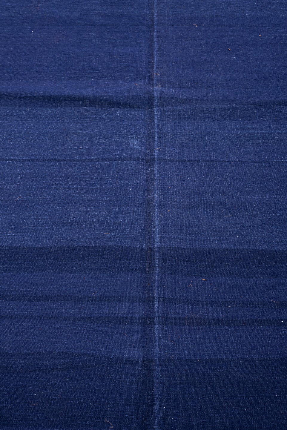 9' x 15' one-of-a-kind handmade antique Cot Dhurrie rug. Color palette: indigo, coral, rose, navy, ivory, purple, terracotta