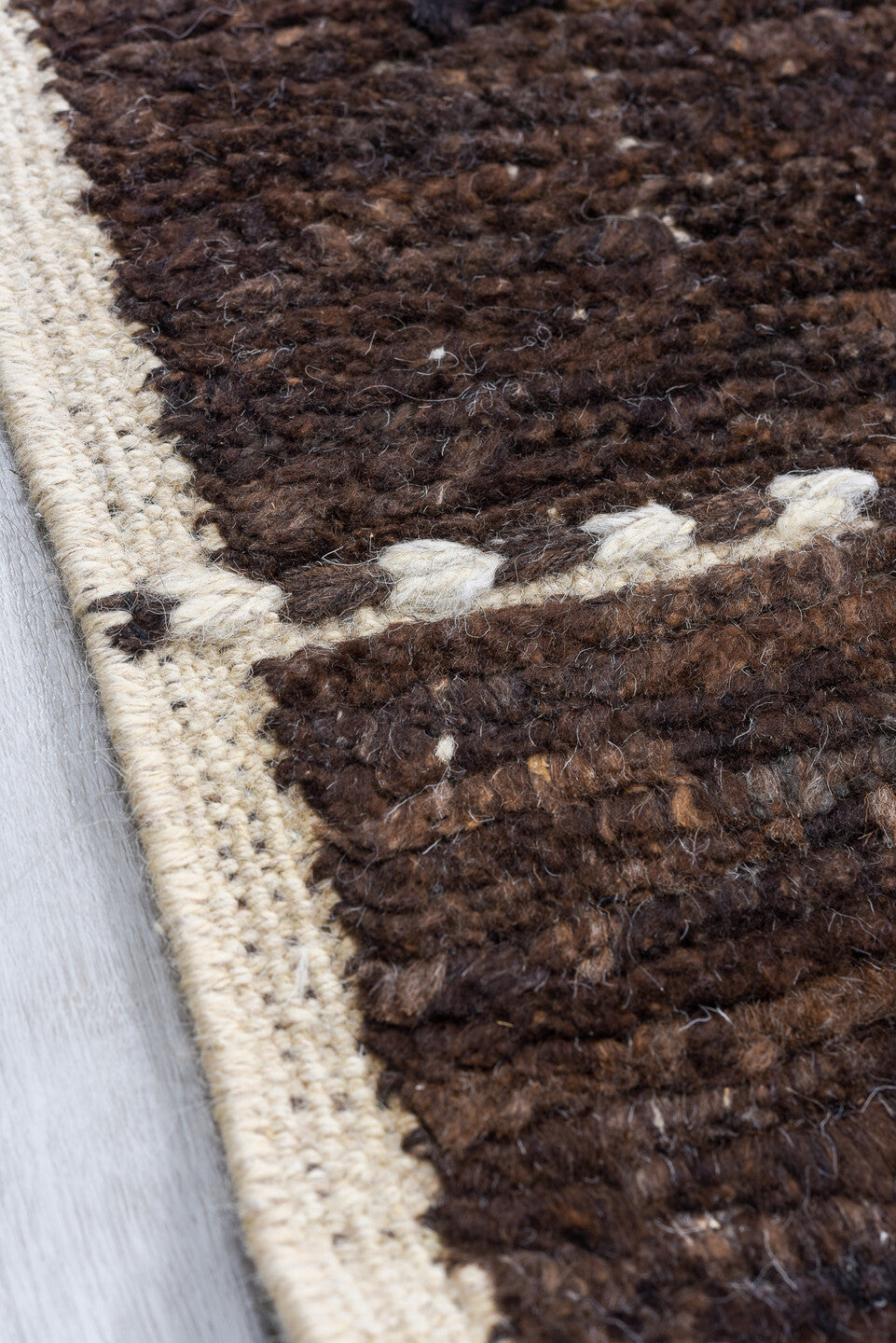 8' x 9' one-of-a-kind handmade vintage Tulu rug. Color palette: black, blue, brown, gray, light gray, off-white