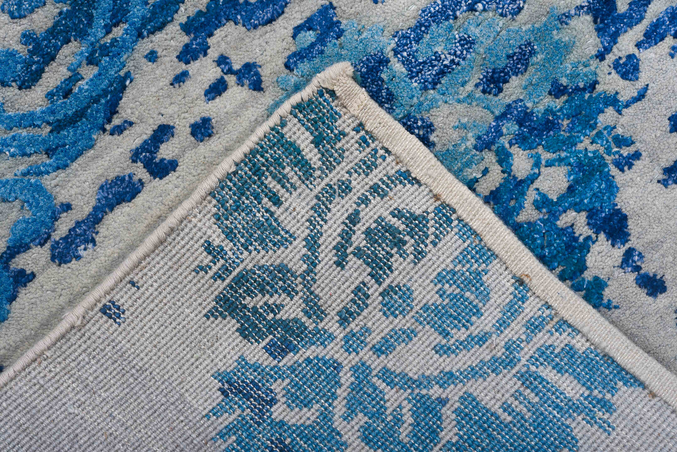 8' x 10' one-of-a-kind handmade handmade Contemporary large size rug. Color palette: ivory, azure, sky blue, cobalt, slate
