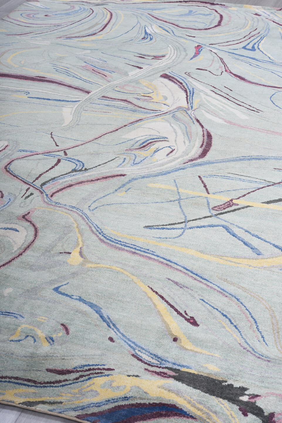 6' x 9' one-of-a-kind handmade handmade Contemporary medium size rug. Color palette: aqua, ivory, blue, plum, pink