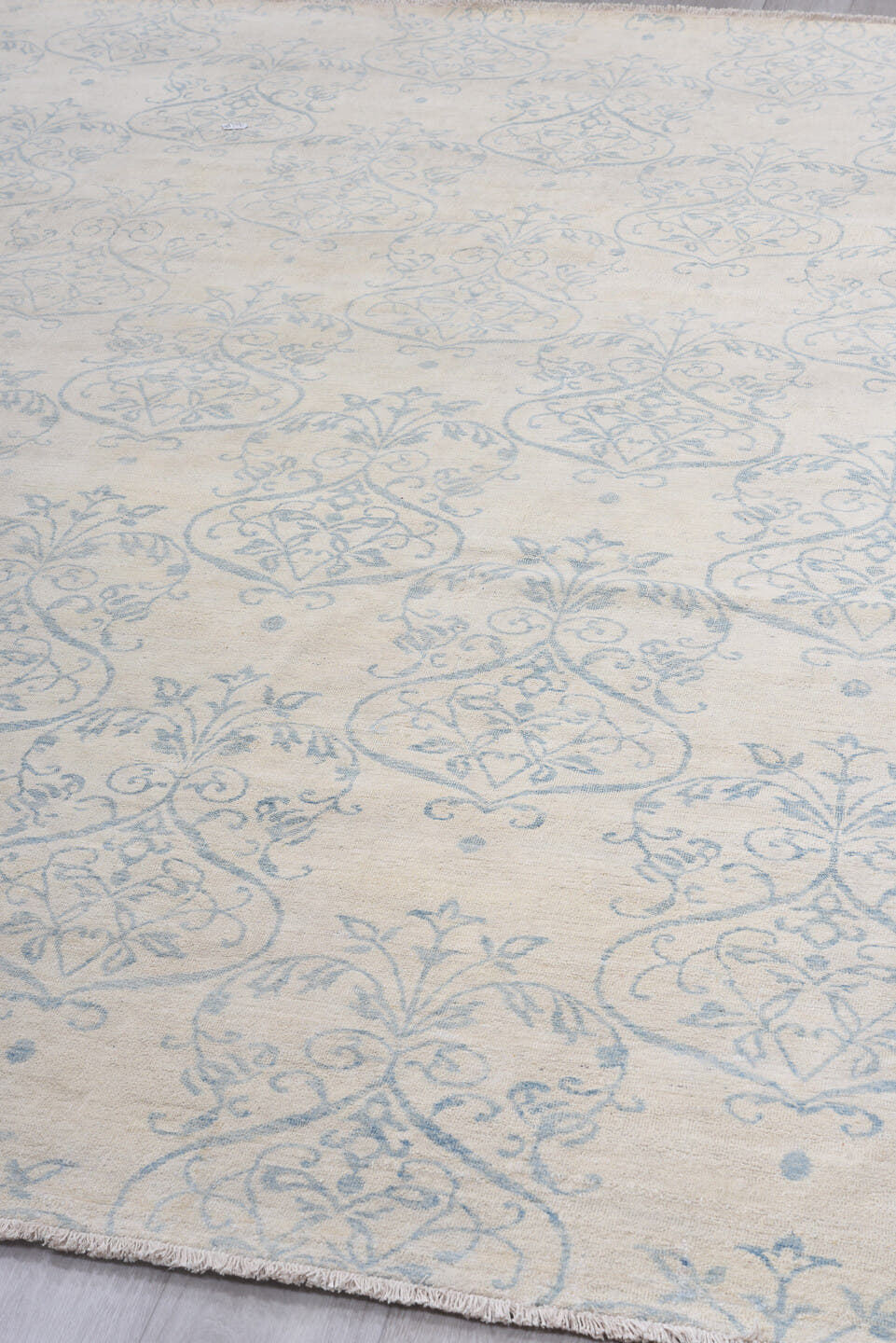 8' x 11' one-of-a-kind handmade vintage European large size rug. Color palette: ivory, pale blue, cream, sky blue, taupe