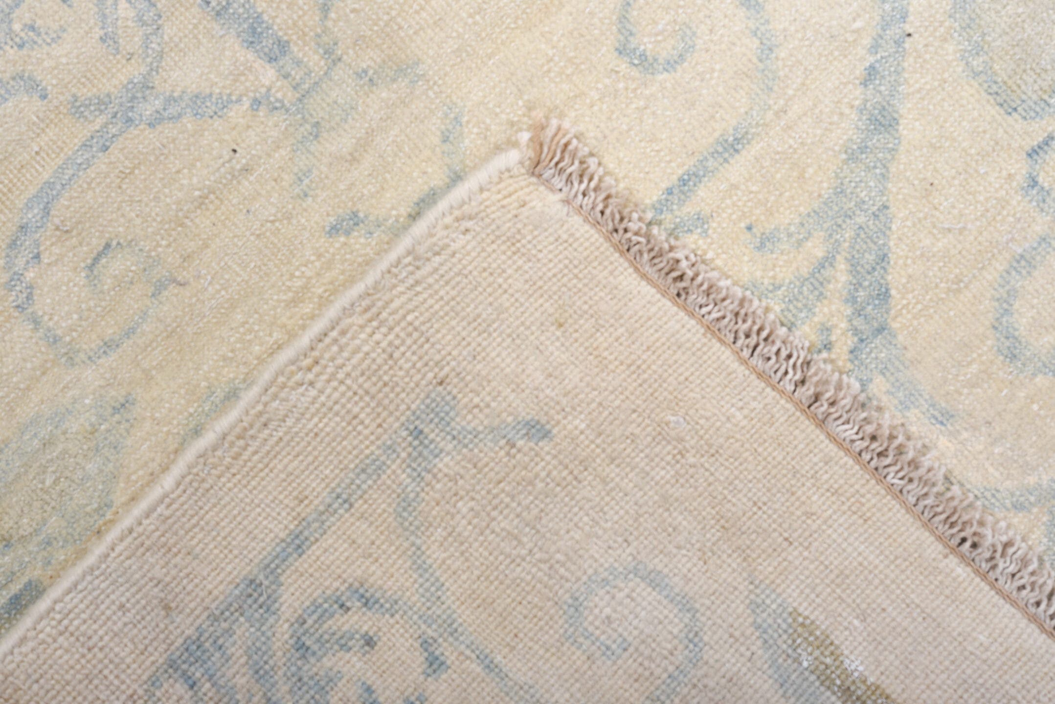 8' x 9' one-of-a-kind handmade vintage European rug. Color palette: ivory, pale blue, cream, beige, light blue