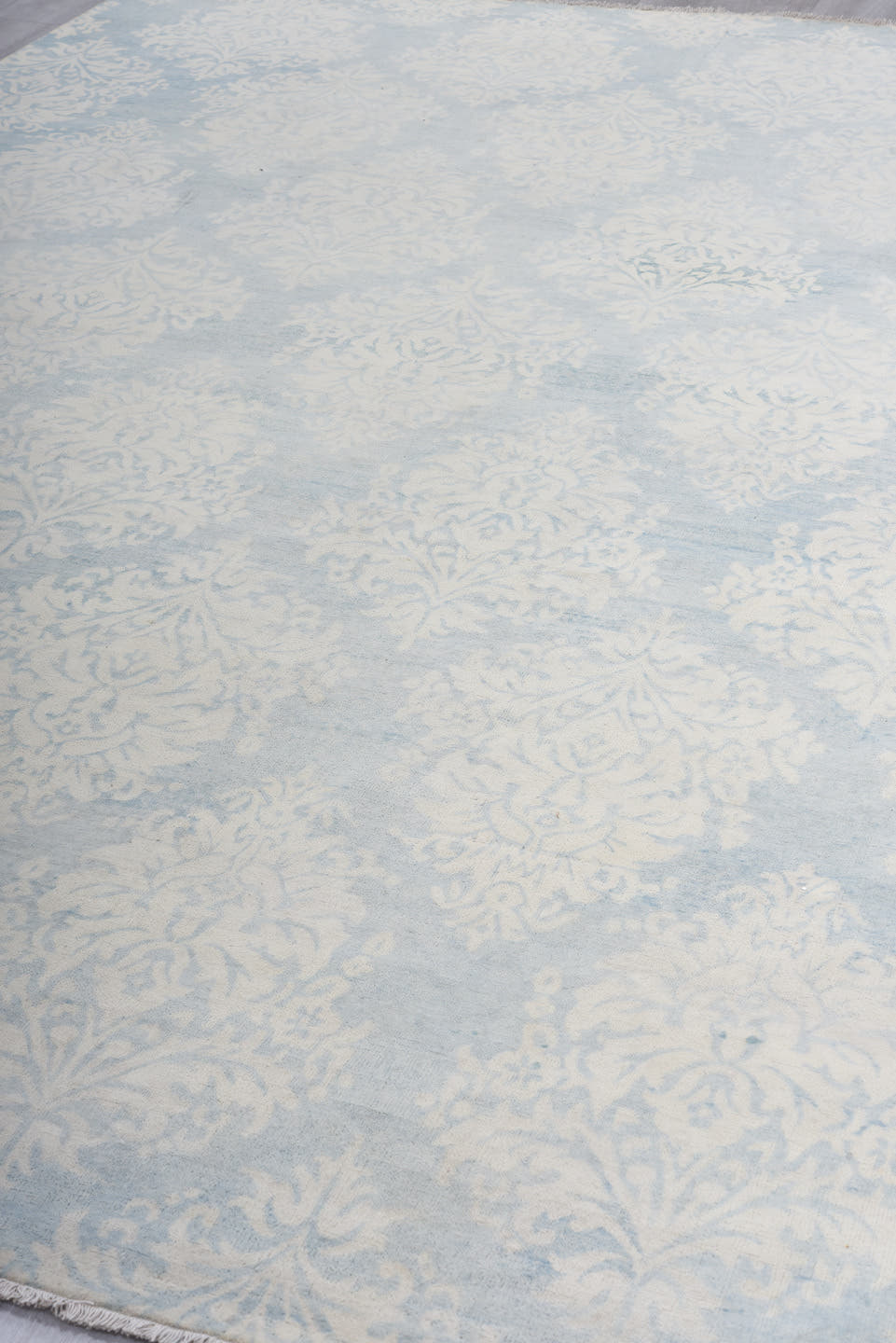 8' x 11' one-of-a-kind handmade vintage European large size rug. Color palette: ivory, pale blue, sky blue, cream, silver