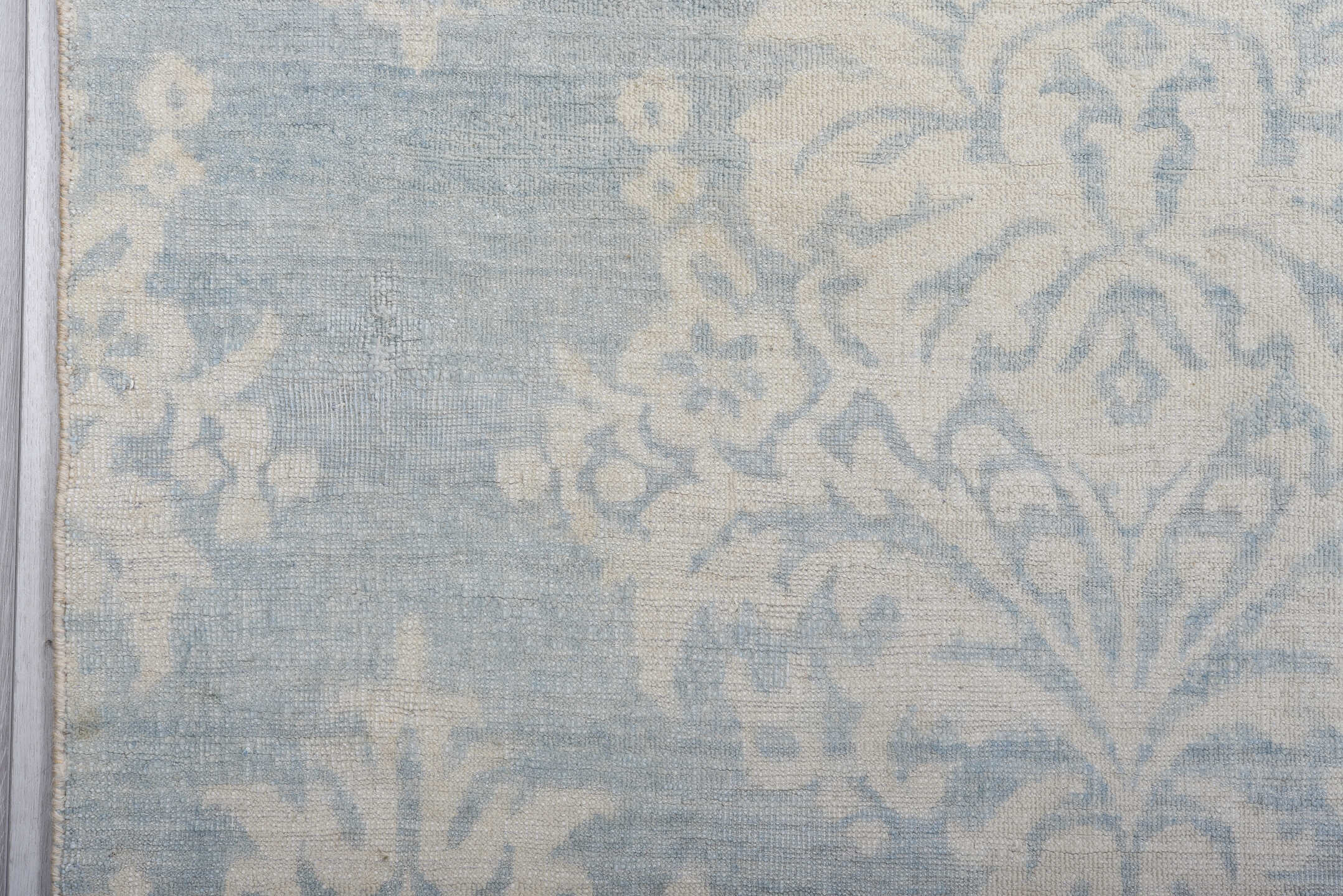 8' x 11' one-of-a-kind handmade vintage European large size rug. Color palette: ivory, pale blue, sky blue, cream, silver