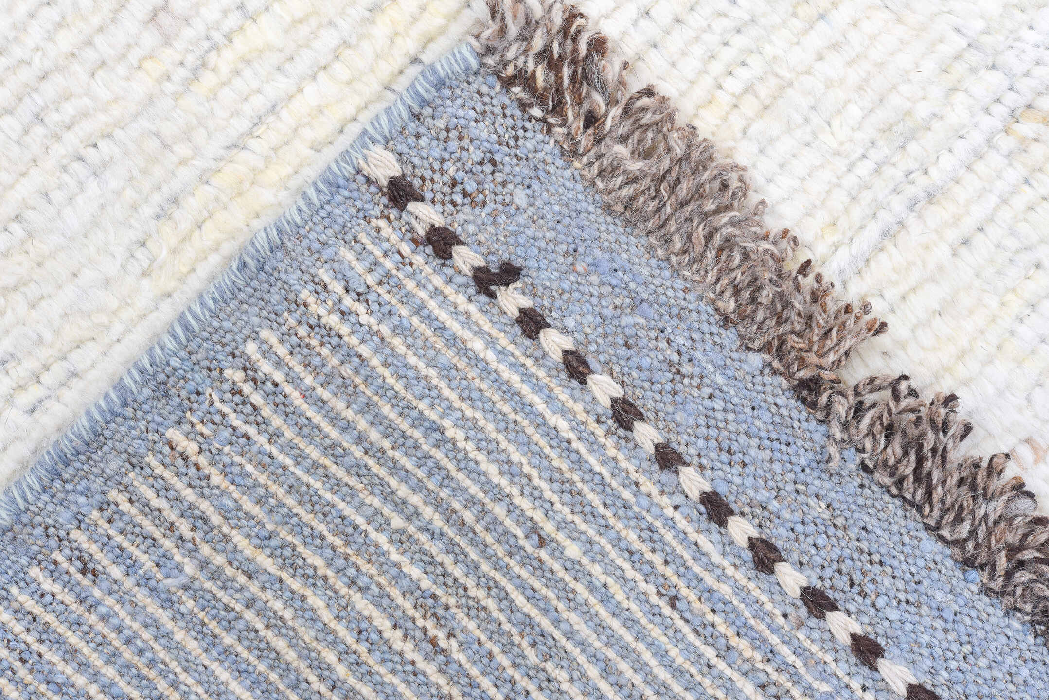 8' x 9' one-of-a-kind handmade vintage  rug. Color palette: ivory, pale blue, taupe, brown, charcoal, light blue, beige