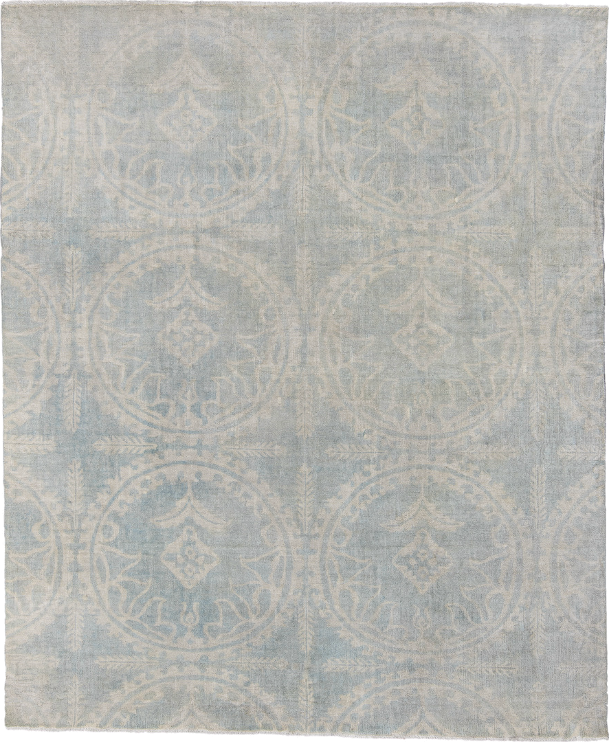 7' x 9' one-of-a-kind handmade vintage European rug. Color palette: pale blue, ivory, cream, silver, taupe, light blue, gray