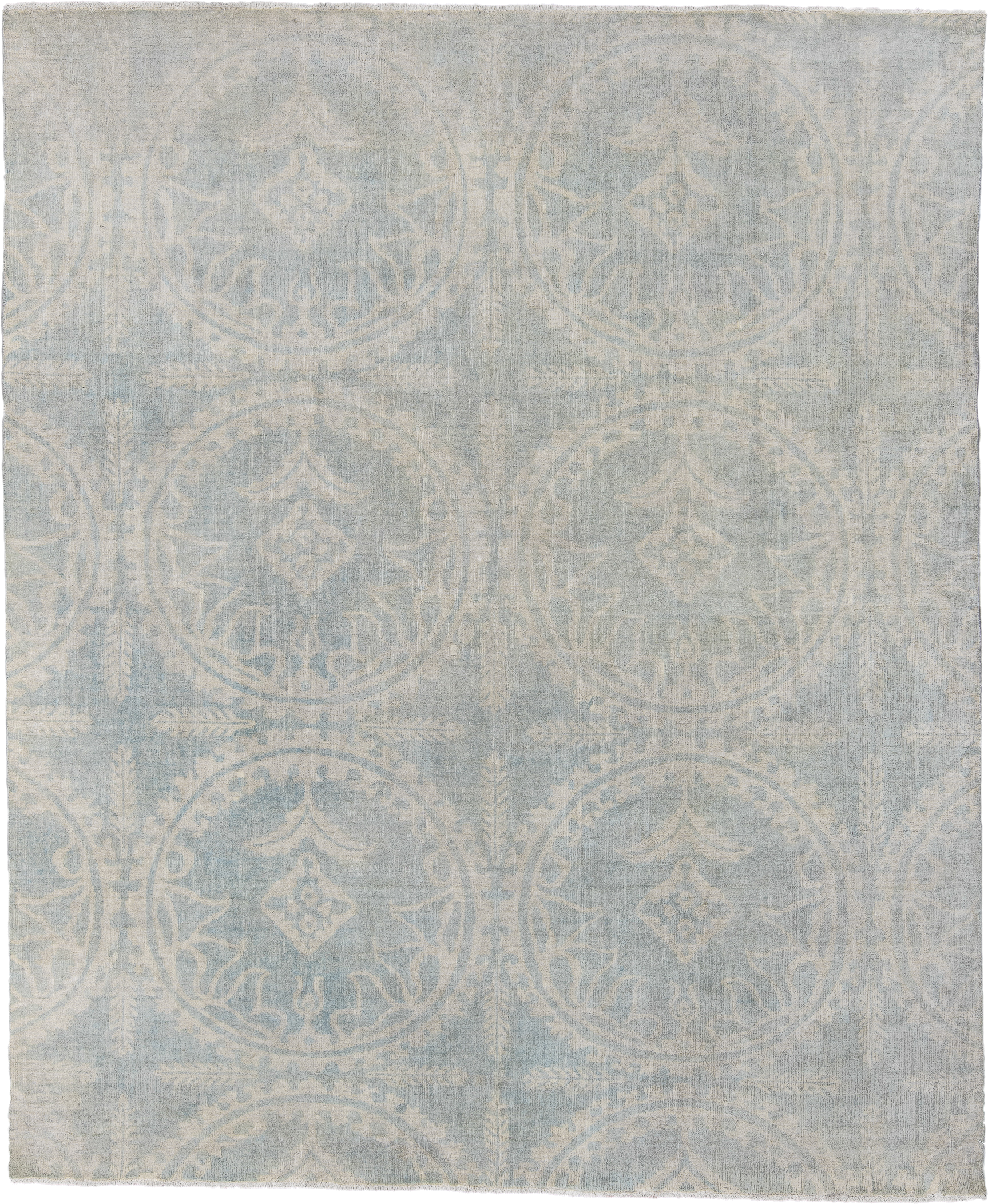 7' x 9' one-of-a-kind handmade vintage European rug. Color palette: pale blue, ivory, cream, silver, taupe, light blue, gray
