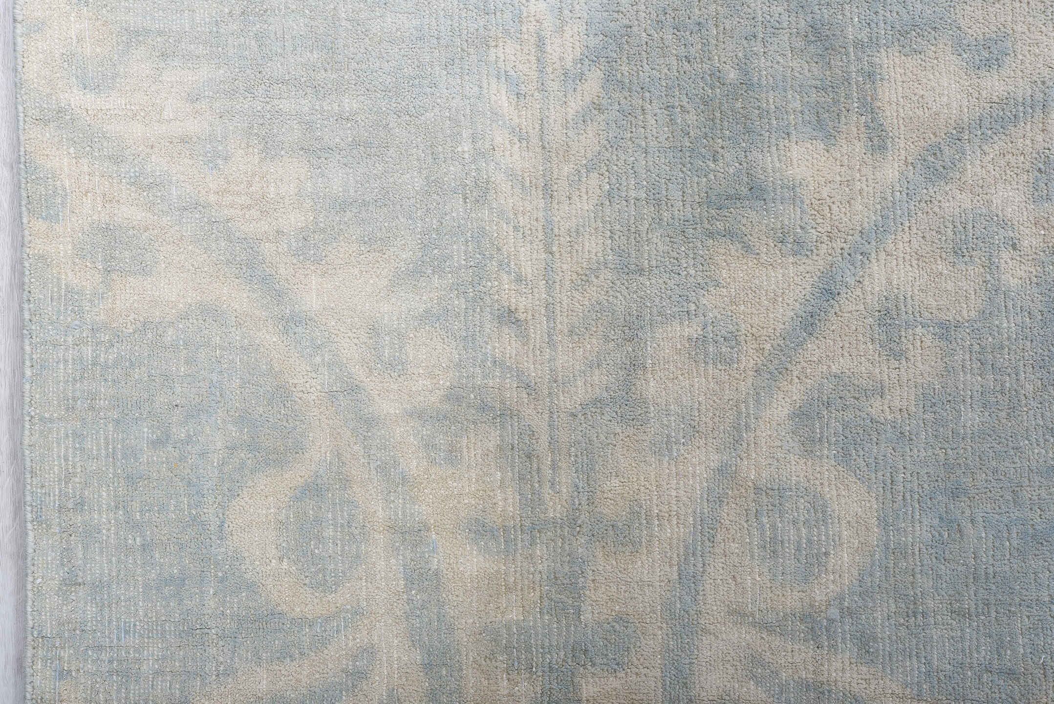 7' x 9' one-of-a-kind handmade vintage European rug. Color palette: pale blue, ivory, cream, silver, taupe, light blue, gray