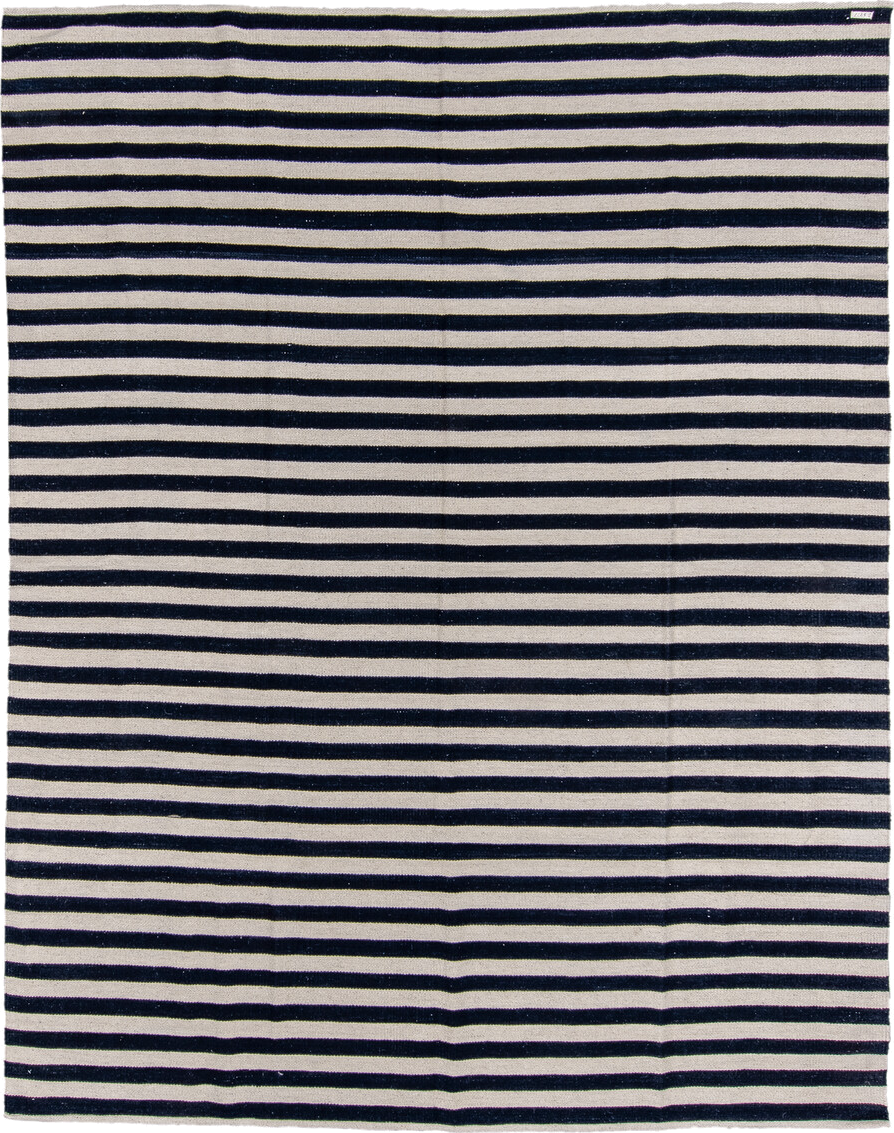 7' x 9' one-of-a-kind handmade vintage Kilim rug. Color palette: ivory, navy, blue