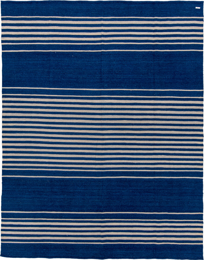 7' x 9' one-of-a-kind handmade vintage Kilim rug. Color palette: indigo, ivory, purple