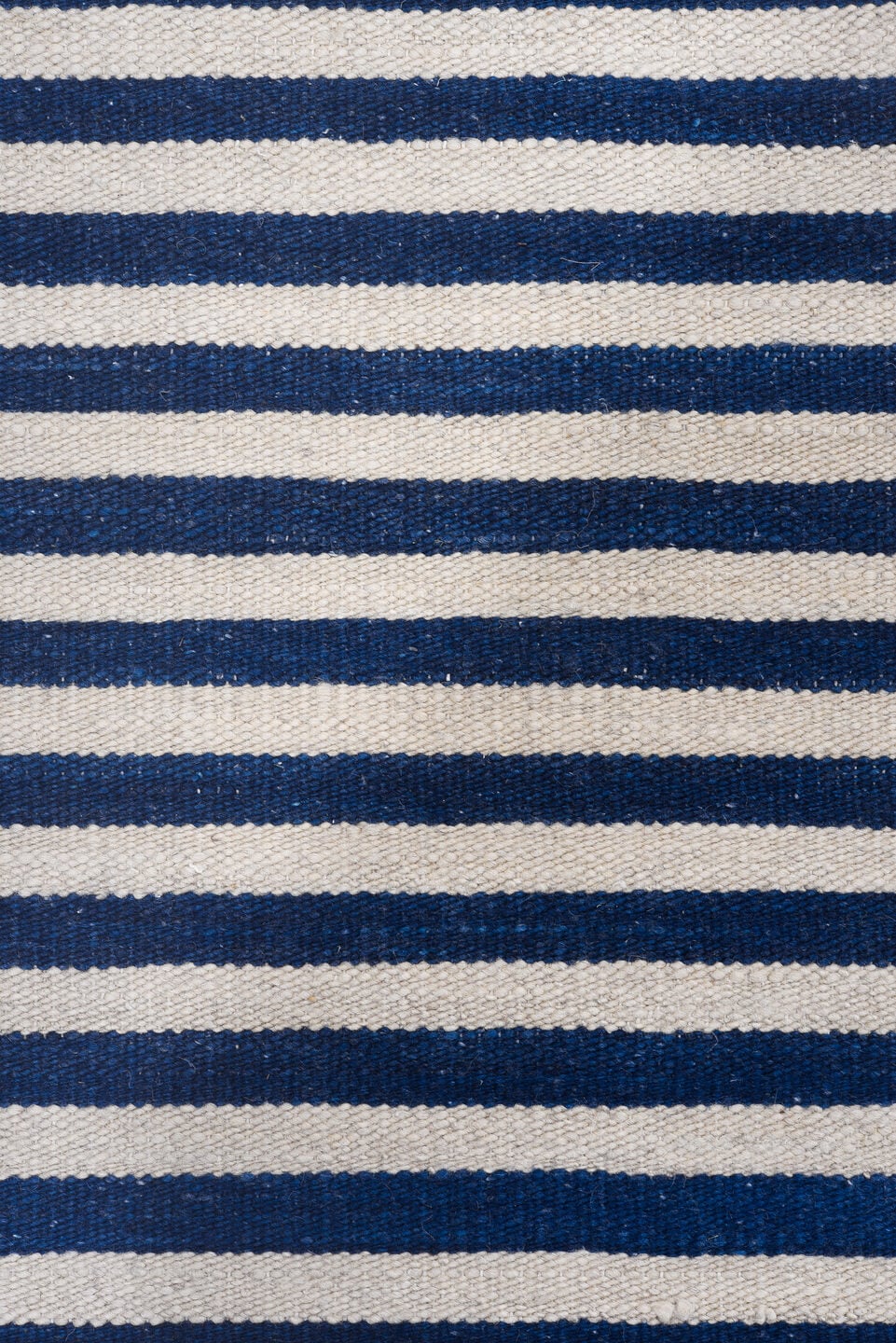 7' x 9' one-of-a-kind handmade vintage Kilim rug. Color palette: indigo, ivory, purple