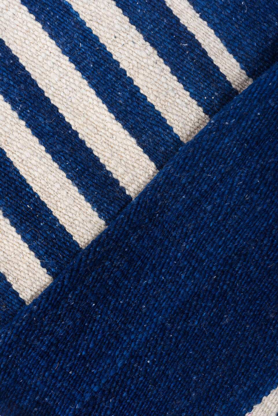 7' x 9' one-of-a-kind handmade vintage Kilim rug. Color palette: indigo, ivory, purple