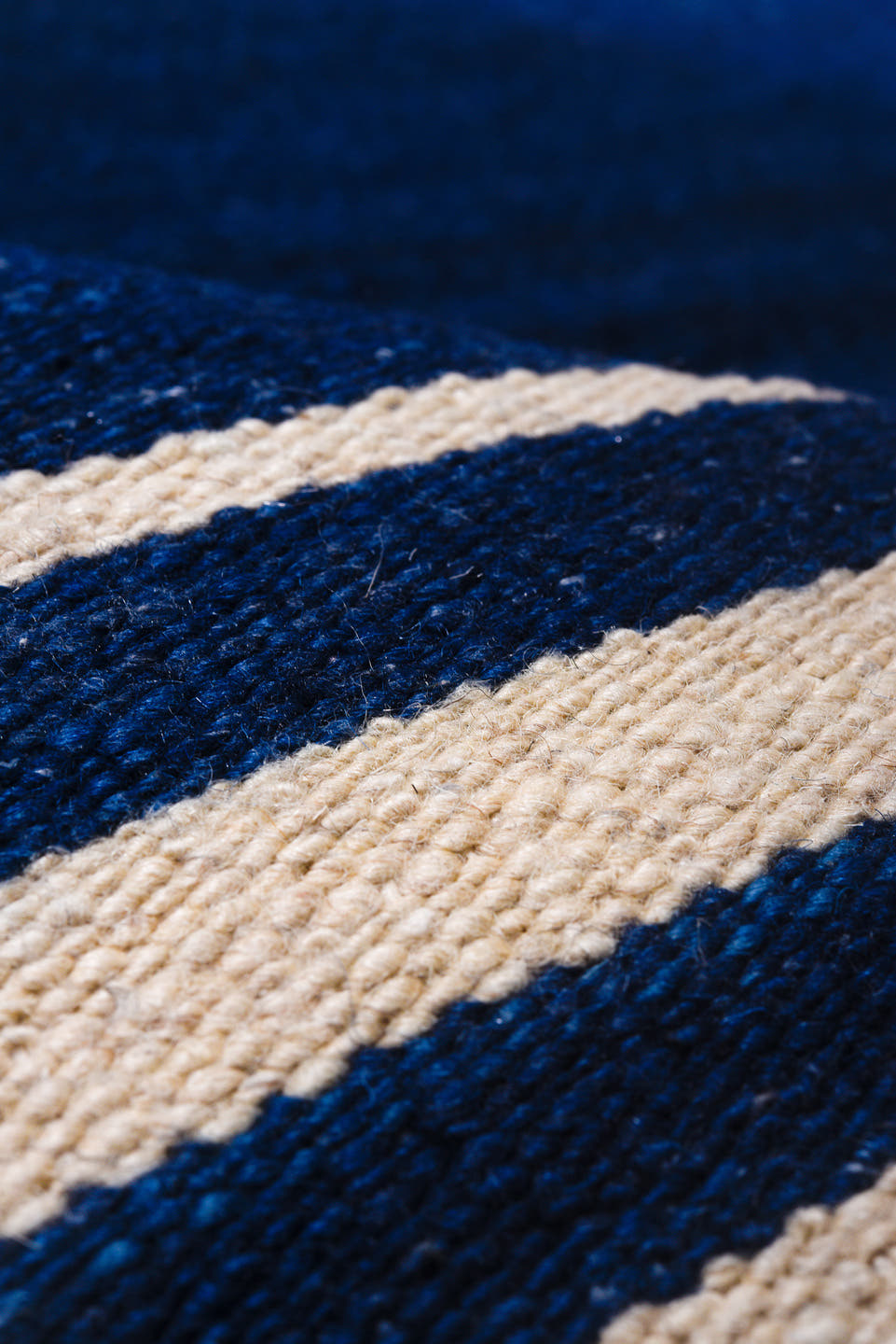 7' x 9' one-of-a-kind handmade vintage Kilim rug. Color palette: indigo, ivory, purple