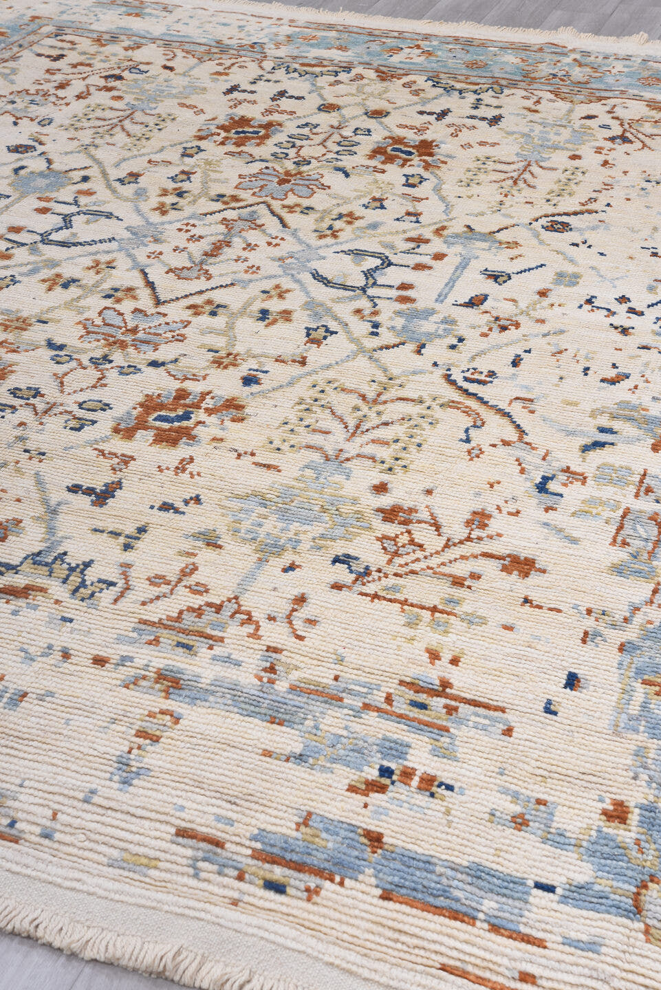 9' x 12' one-of-a-kind handmade vintage Tulu large size rug. Color palette: ivory, pale blue, rust, beige, cobalt