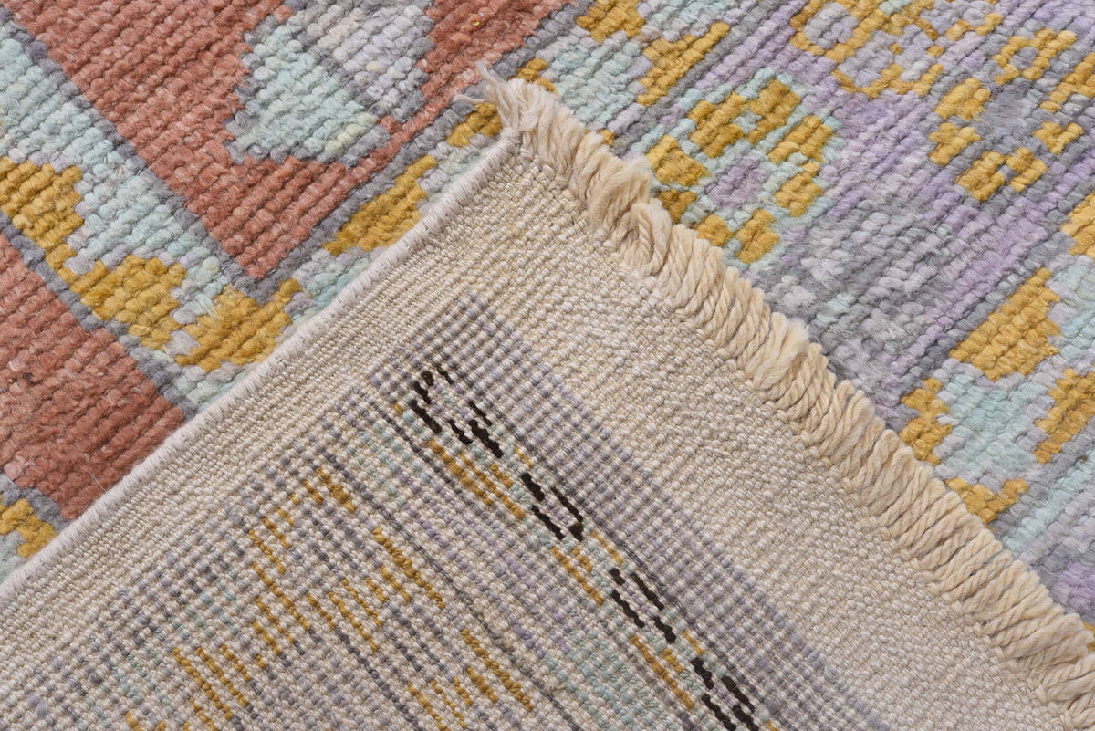 8' x 12' one-of-a-kind handmade vintage Tulu large size rug. Color palette: peach, lavender, ivory, gold, crimson, charcoal