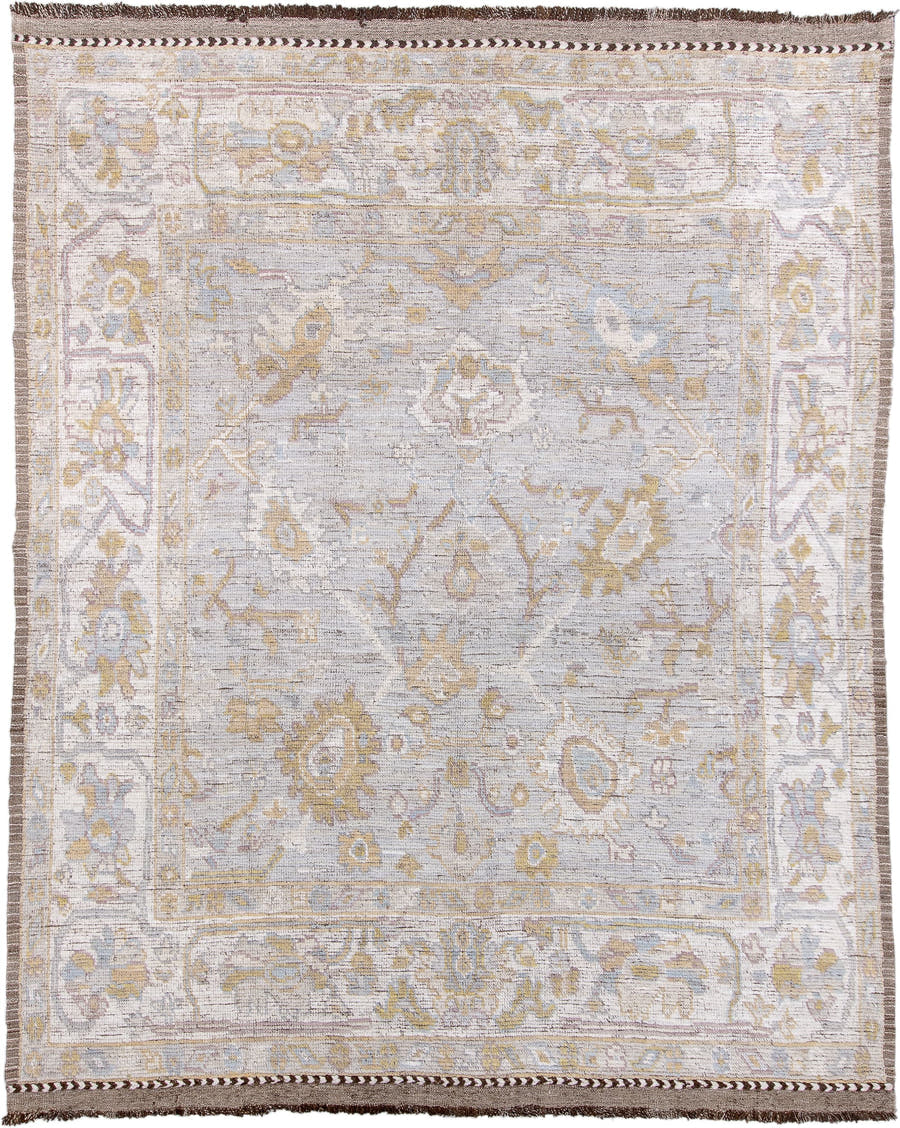 9' x 12' one-of-a-kind handmade vintage Tulu large size rug. Color palette: ivory, light gray, gold, blush, pale blue, taupe