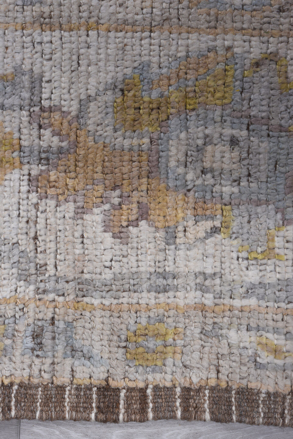 9' x 12' one-of-a-kind handmade vintage Tulu large size rug. Color palette: ivory, light gray, gold, blush, pale blue, taupe
