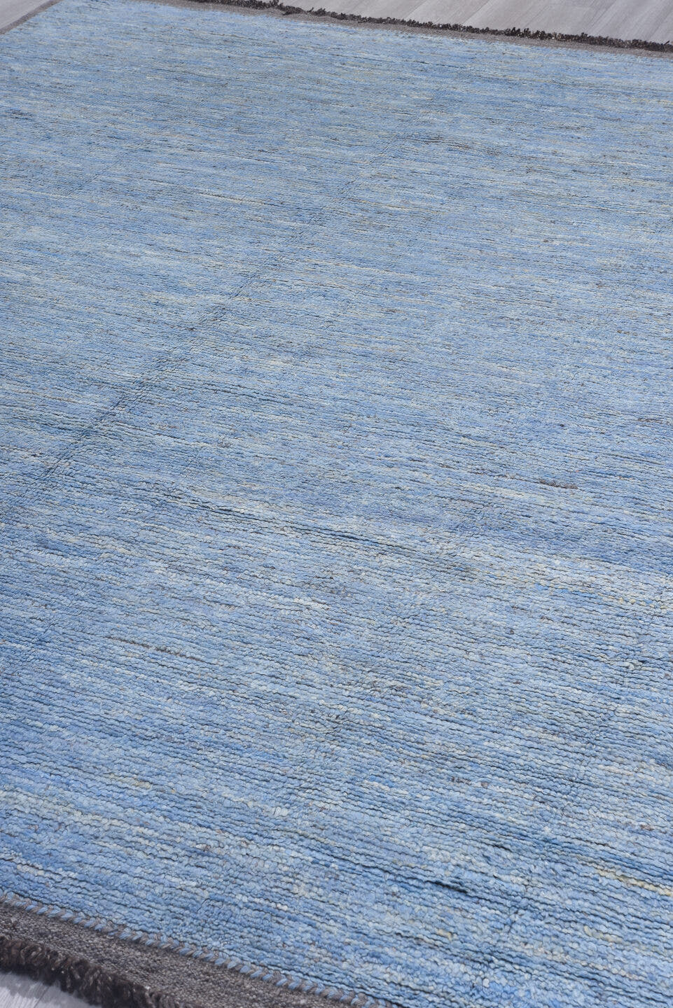 9' x 11' one-of-a-kind handmade vintage Tulu large size rug. Color palette: sky blue, slate, charcoal, ivory, light blue