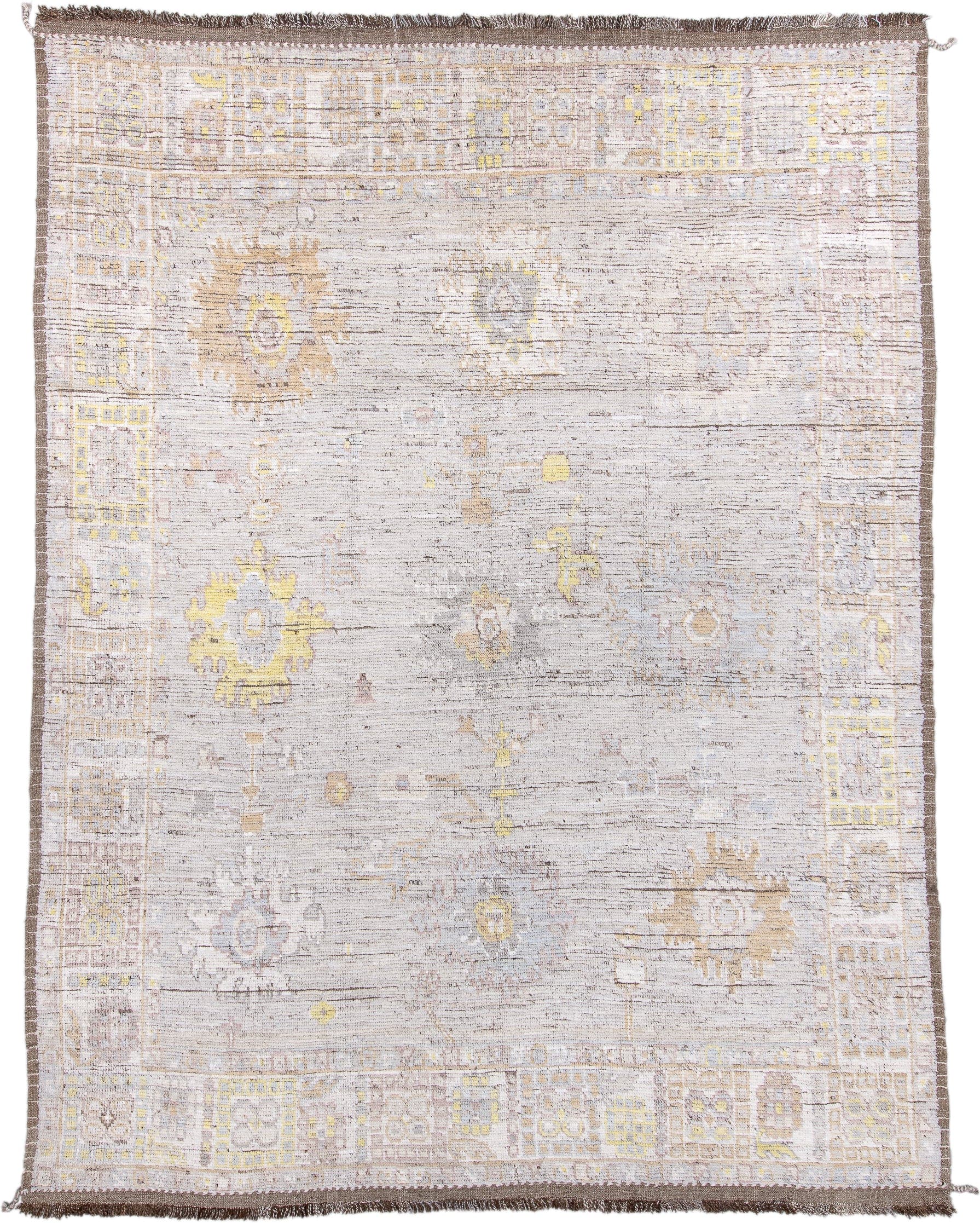 9' x 12' one-of-a-kind handmade vintage Tulu large size rug. Color palette: ivory, taupe, pale_gold, soft_gray, beige, camel