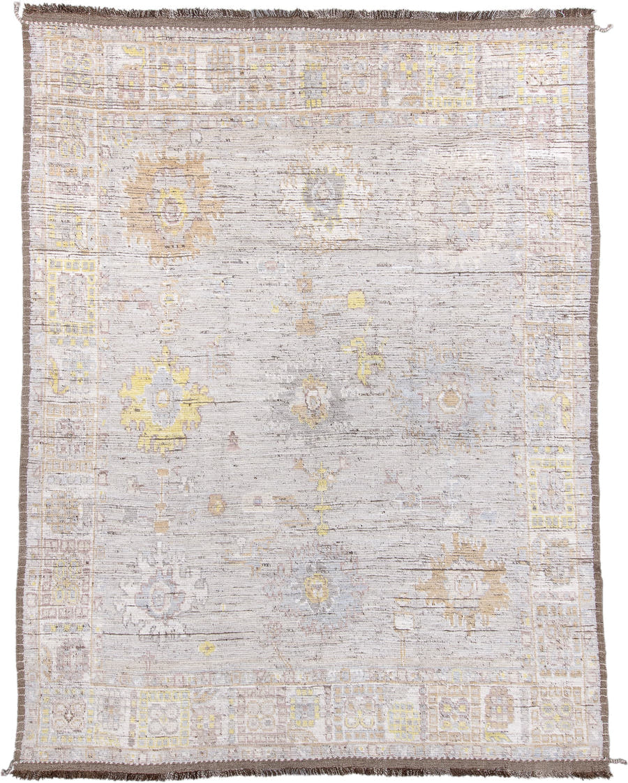 9' x 12' one-of-a-kind handmade vintage Tulu large size rug. Color palette: ivory, taupe, pale_gold, soft_gray, beige, camel