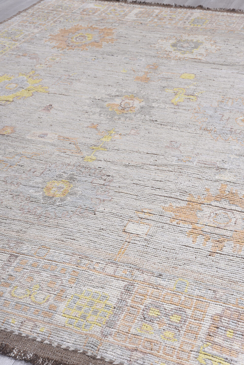 9' x 12' one-of-a-kind handmade vintage Tulu large size rug. Color palette: ivory, taupe, pale_gold, soft_gray, beige, camel