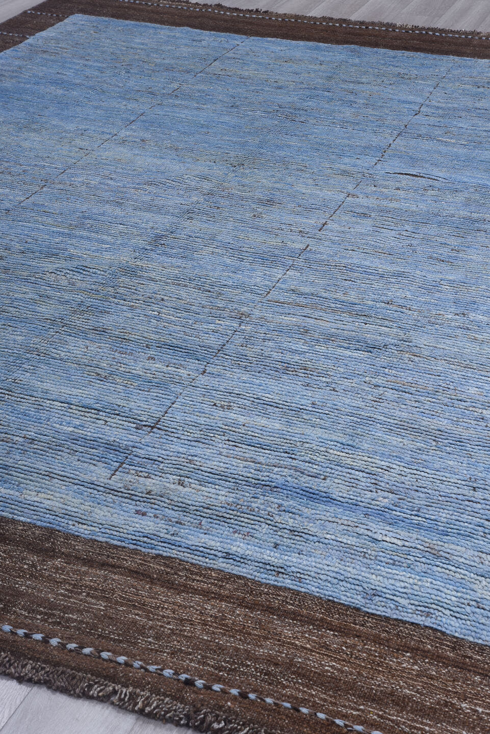 9' x 12' one-of-a-kind handmade vintage Tulu large size rug. Color palette: light blue, brown, taupe, beige, gray