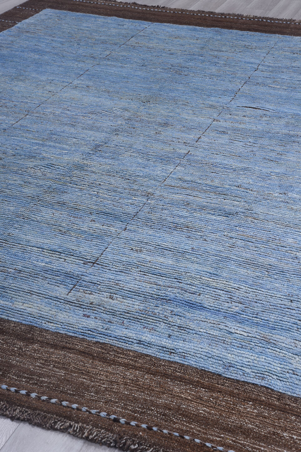 9' x 12' one-of-a-kind handmade vintage Tulu large size rug. Color palette: light blue, brown, taupe, beige, gray
