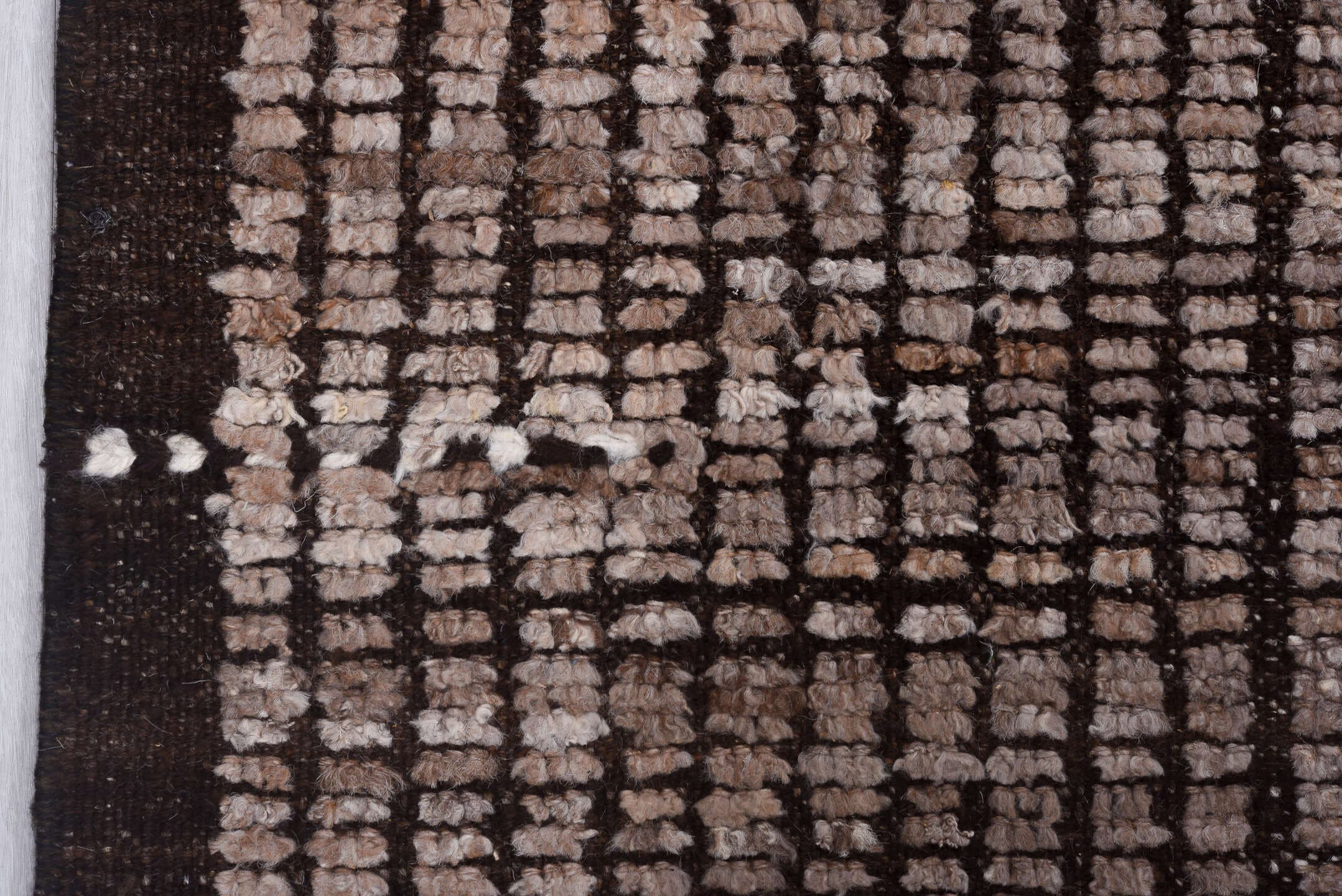 8' x 9' one-of-a-kind handmade vintage Tulu rug. Color palette: taupe, brown, charcoal, ivory, beige, gray, black