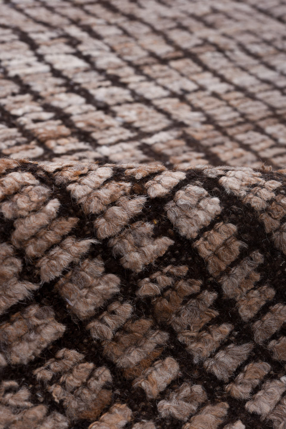 8' x 9' one-of-a-kind handmade vintage Tulu rug. Color palette: taupe, brown, charcoal, ivory, beige, gray, black