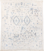 8' x 9' one-of-a-kind handmade vintage Tulu rug. Color palette: ivory, pale blue, light gray, cream, taupe, light blue