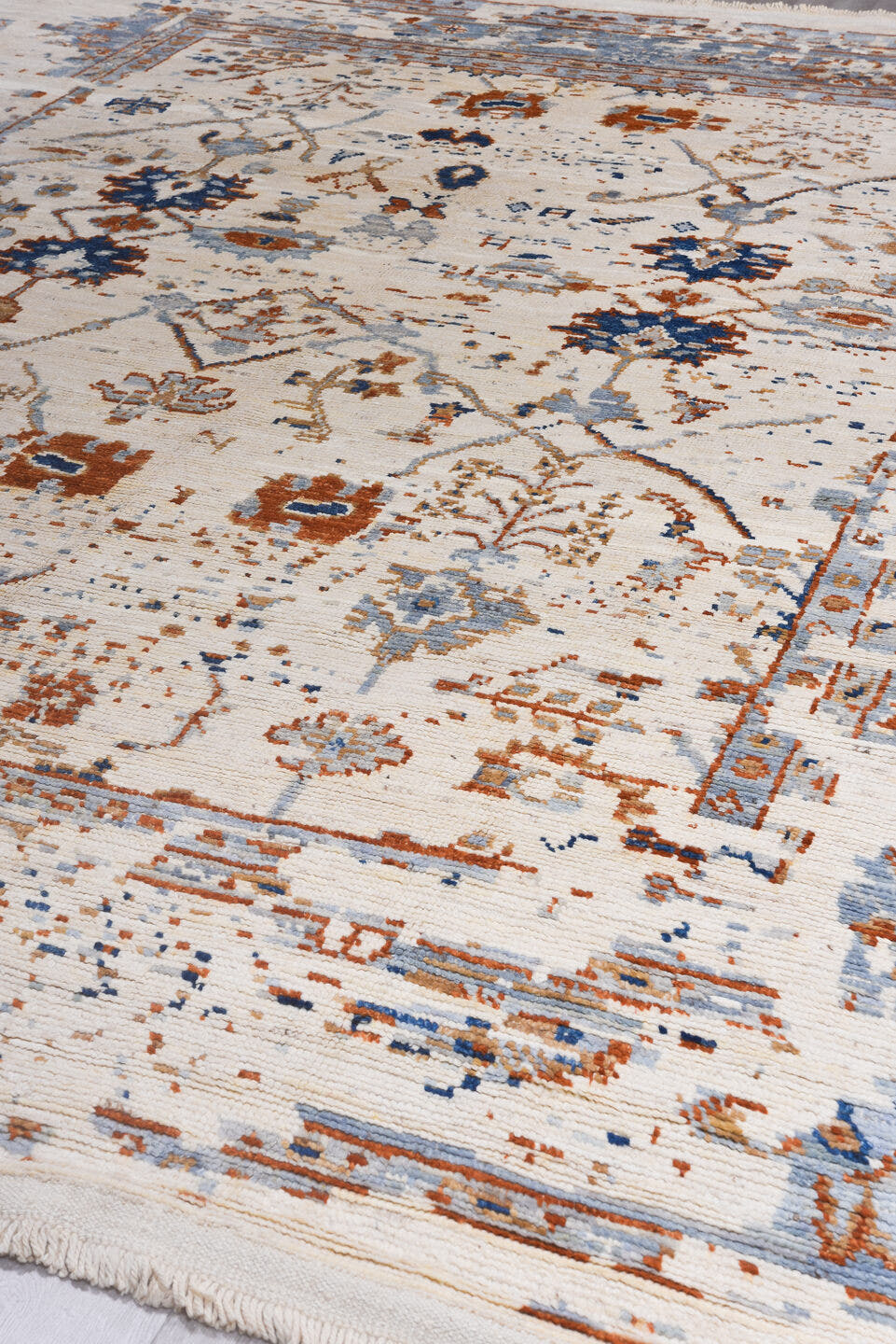10' x 13' one-of-a-kind handmade vintage Tulu large size rug. Color palette: ivory, powder_blue, rust, camel, taupe, cobalt