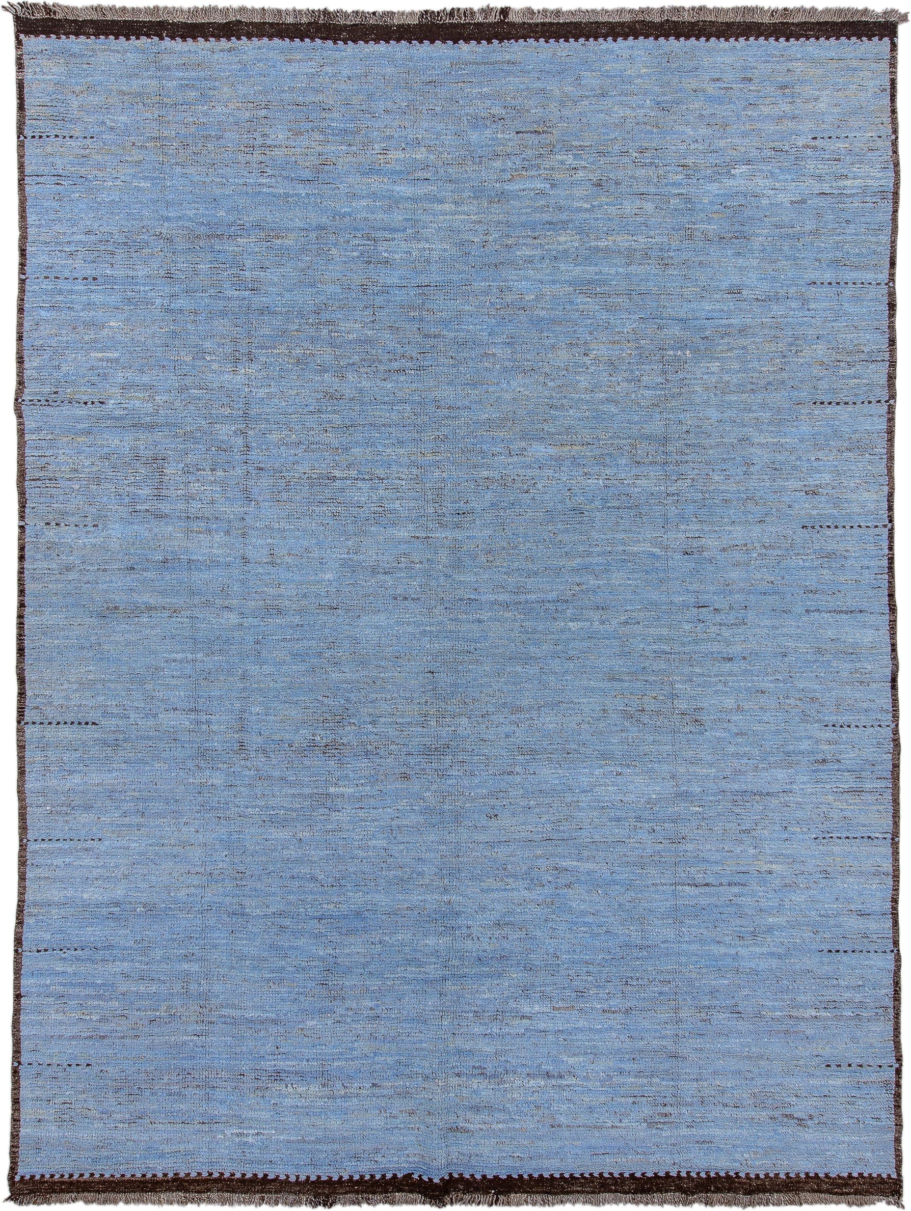 9' x 13' one-of-a-kind handmade vintage Tulu large size rug. Color palette: sky blue, charcoal, slate, ivory, light blue