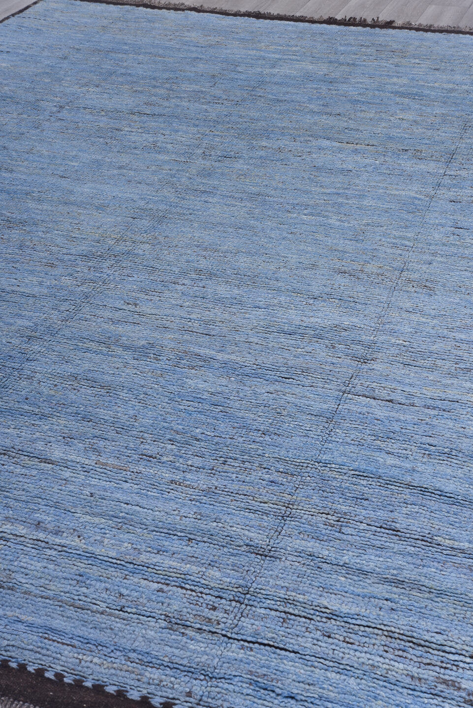 9' x 13' one-of-a-kind handmade vintage Tulu large size rug. Color palette: sky blue, charcoal, slate, ivory, light blue