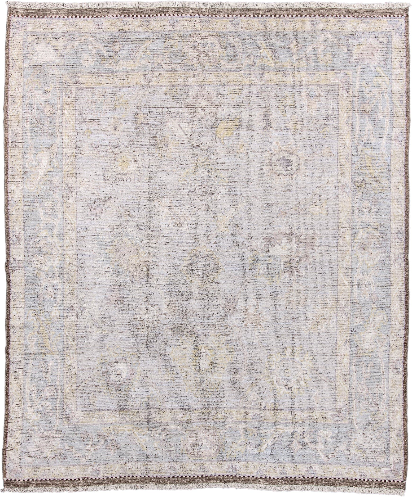 8' x 10' one-of-a-kind handmade vintage Tulu large size rug. Color palette: ivory, taupe, pale blue, cream, gold, beige